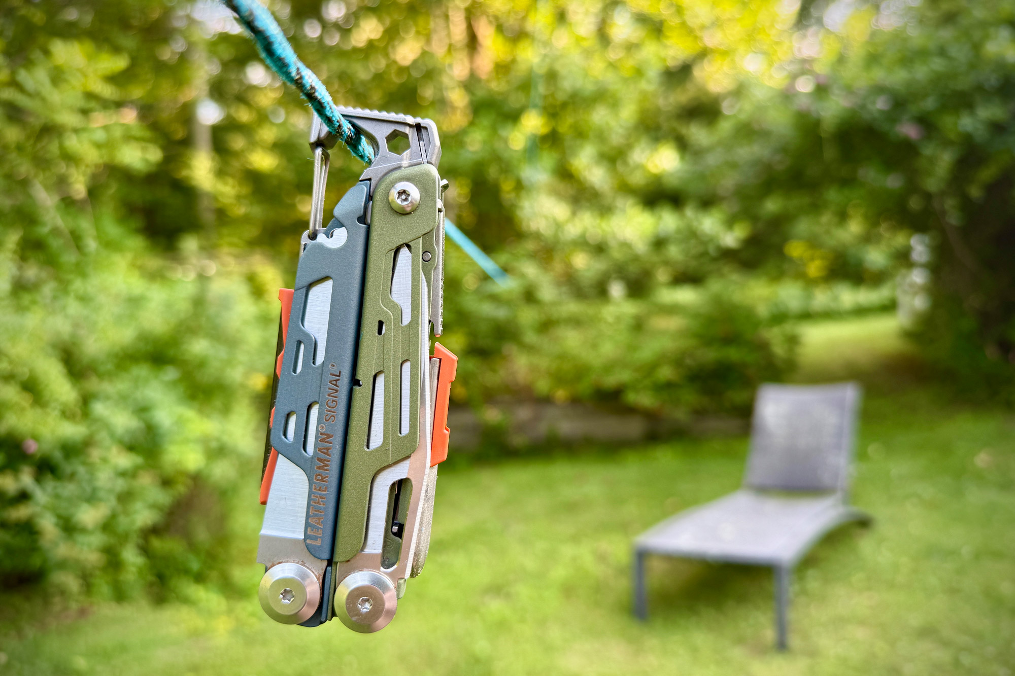 Leatherman Signal hanging by its carabiner on a rope