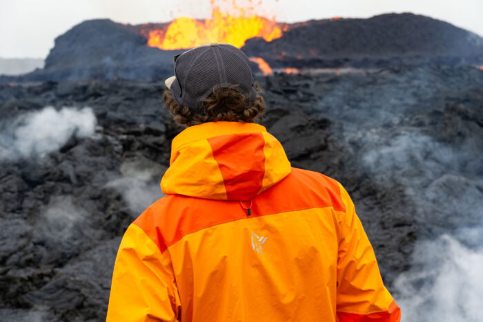 Norrøna Trollveggen In Front of Iceland Volcano