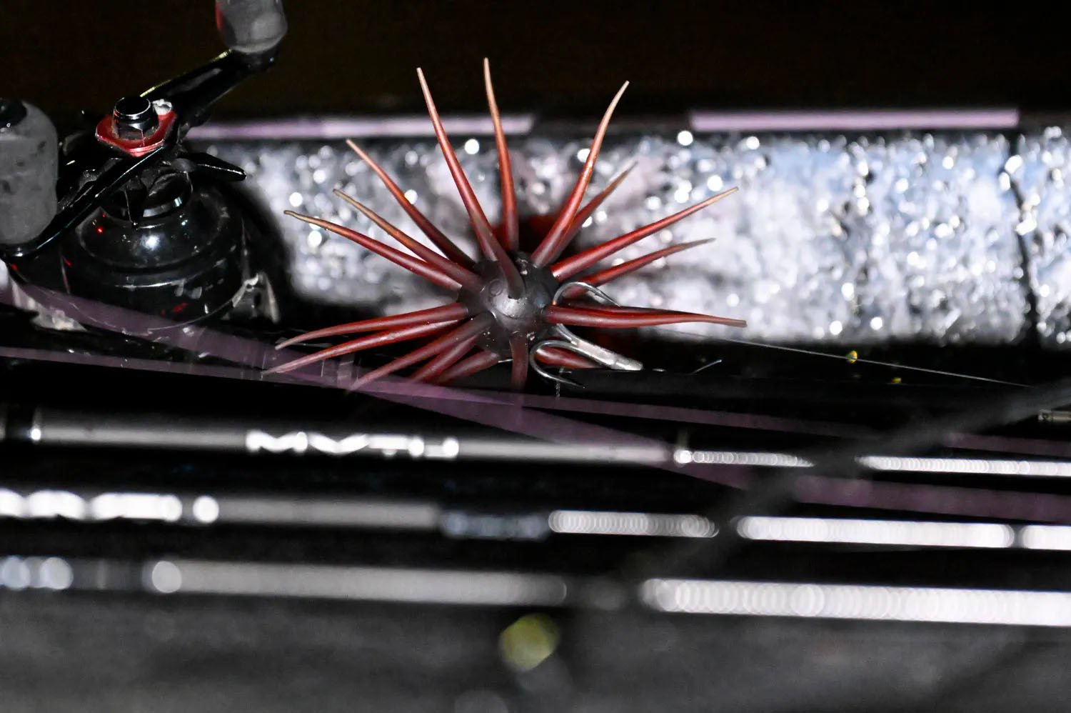 A dice bait on the bow of a bass fishing boat.