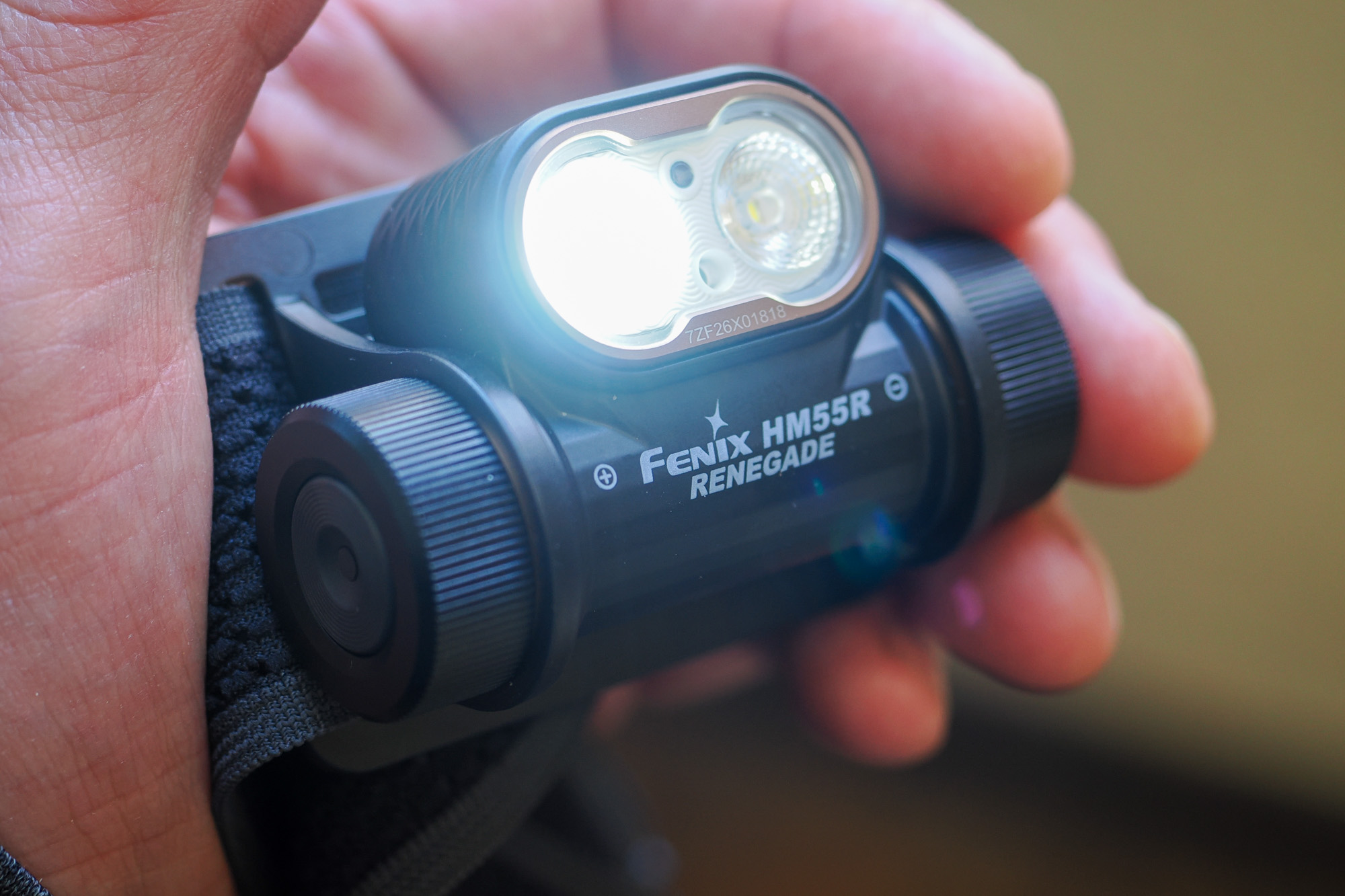 Fenix HM55R Renegade headlamp in hand