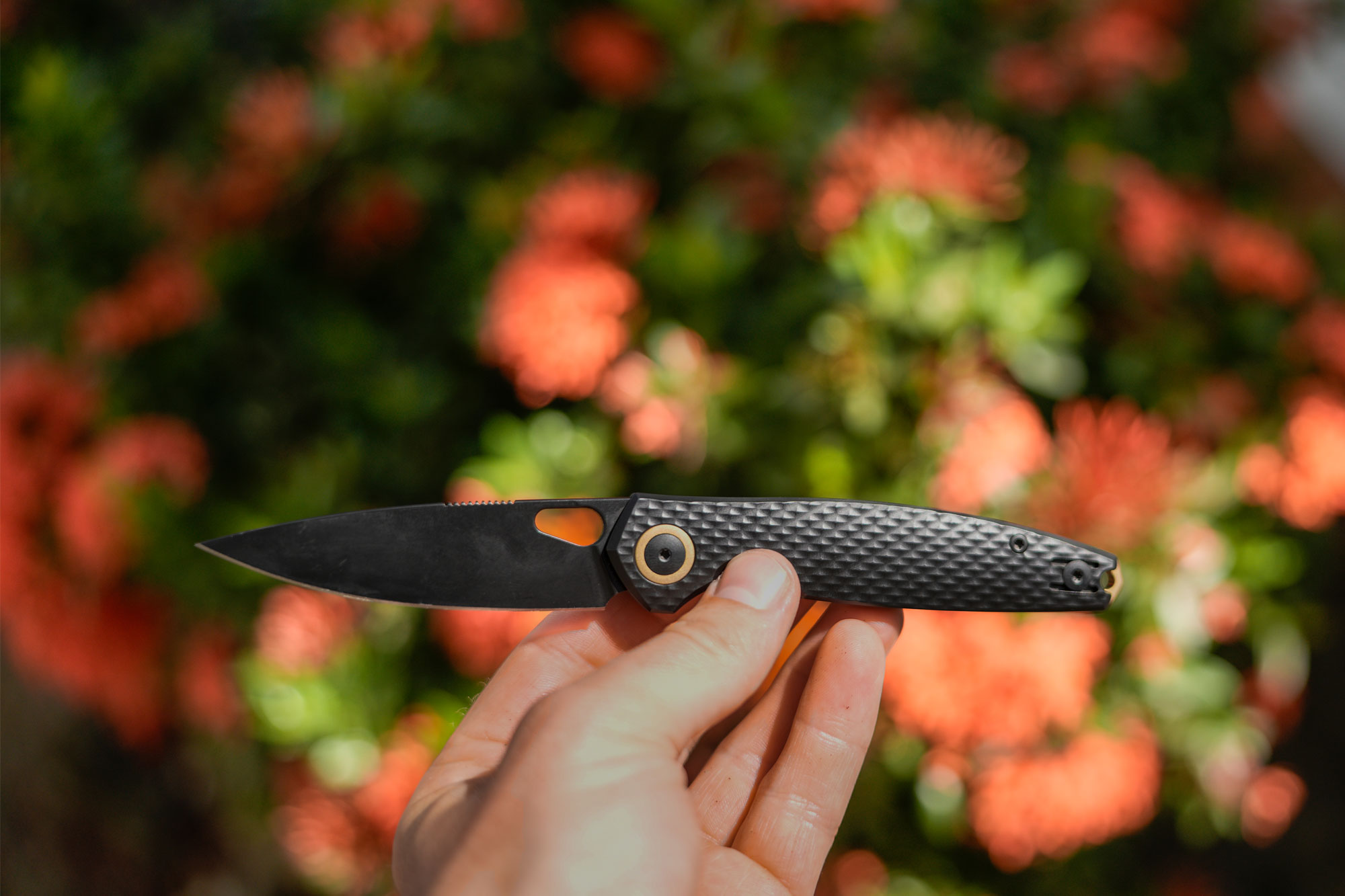 GiantMouse ACE REO Black and Brass with floral background