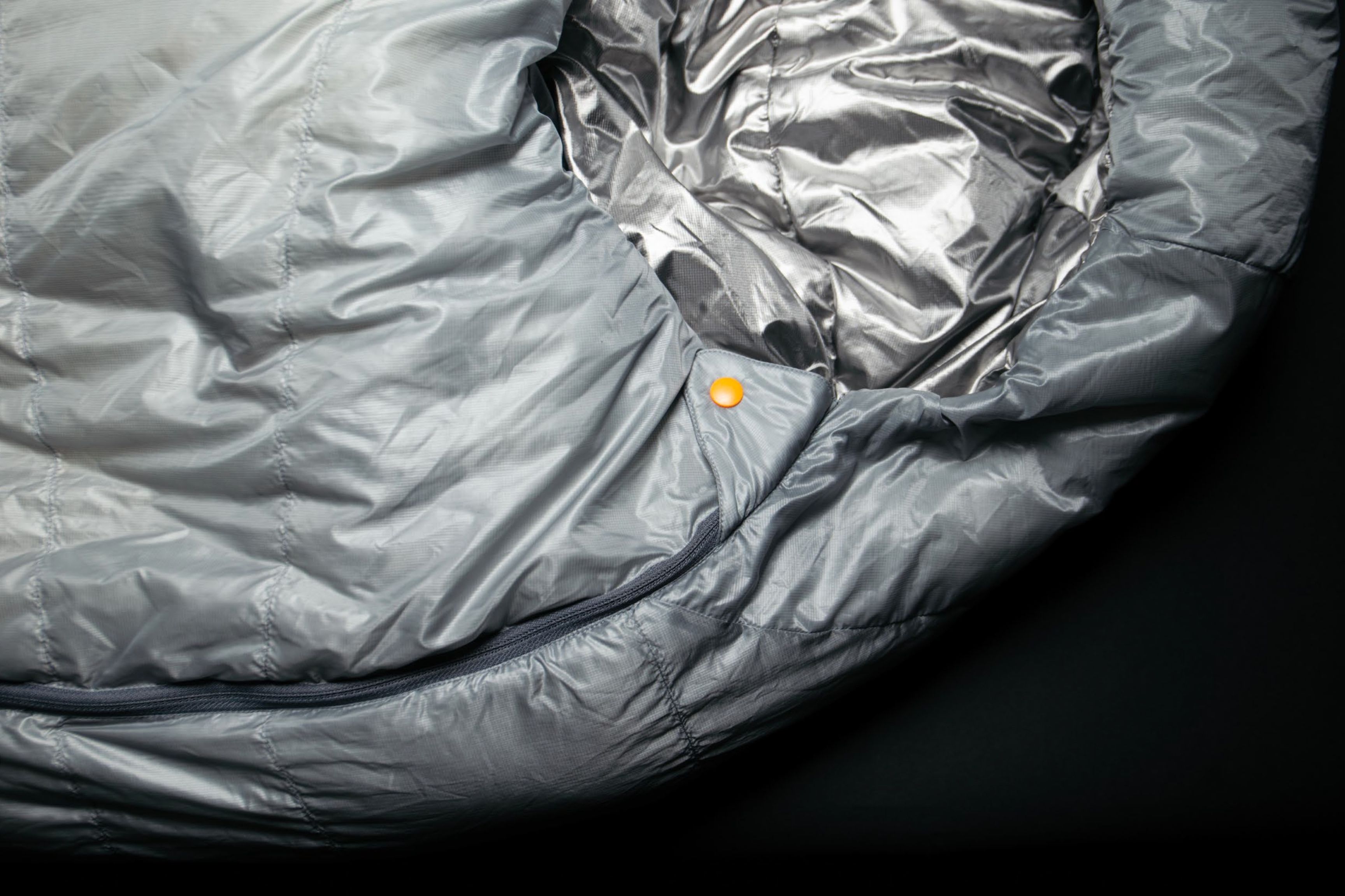 close-up shot of silver and white sleeping bag