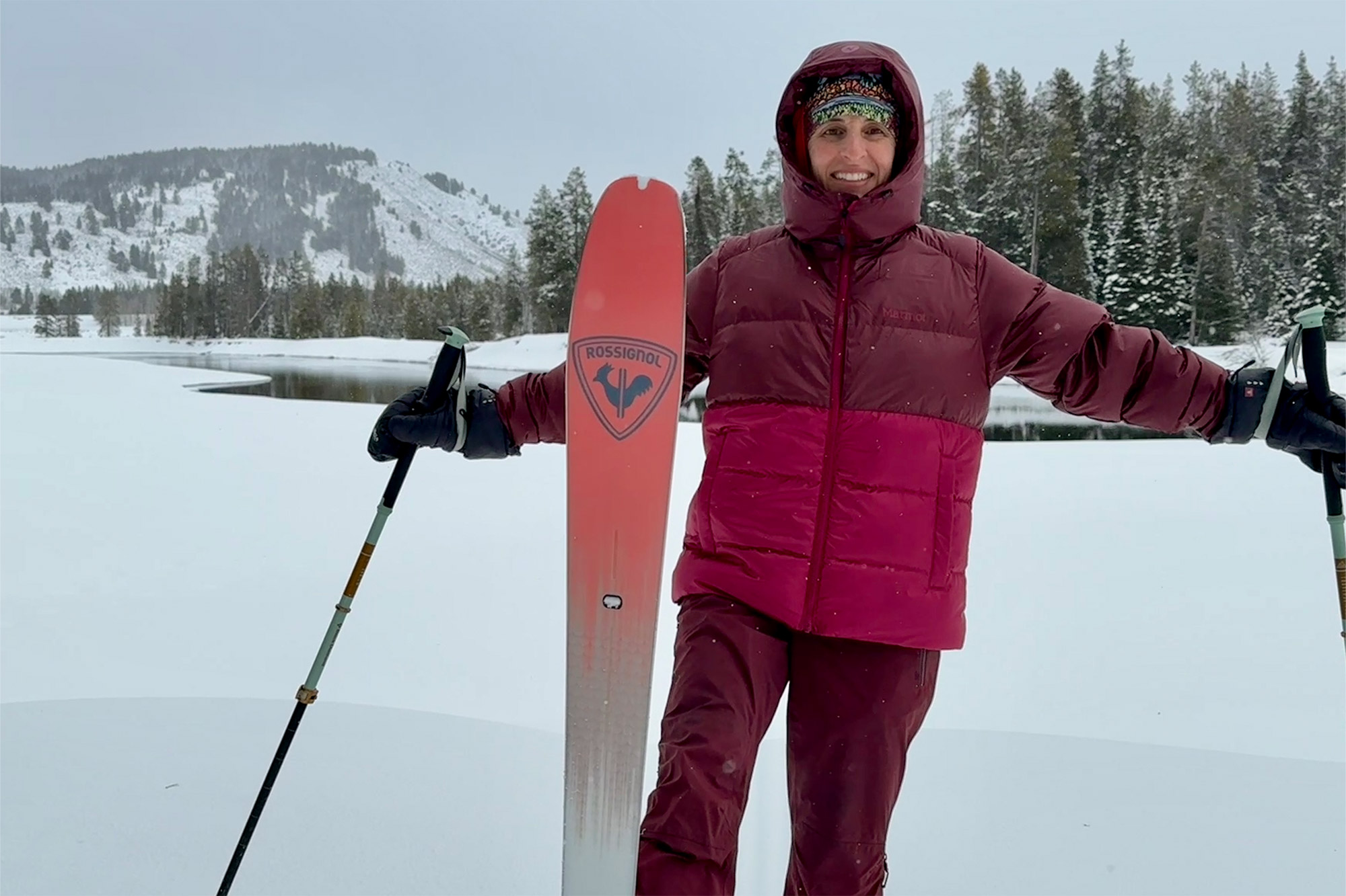 A single Rossignol XP 105 Positrack ski is planted upright in deep snow