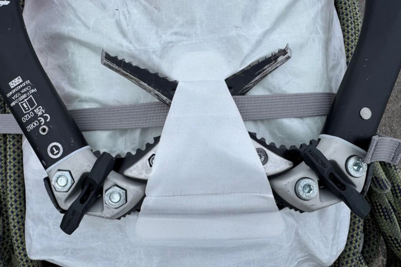 Ice tools attached to the Arc’teryx Alpha SL pack using the integrated carry system