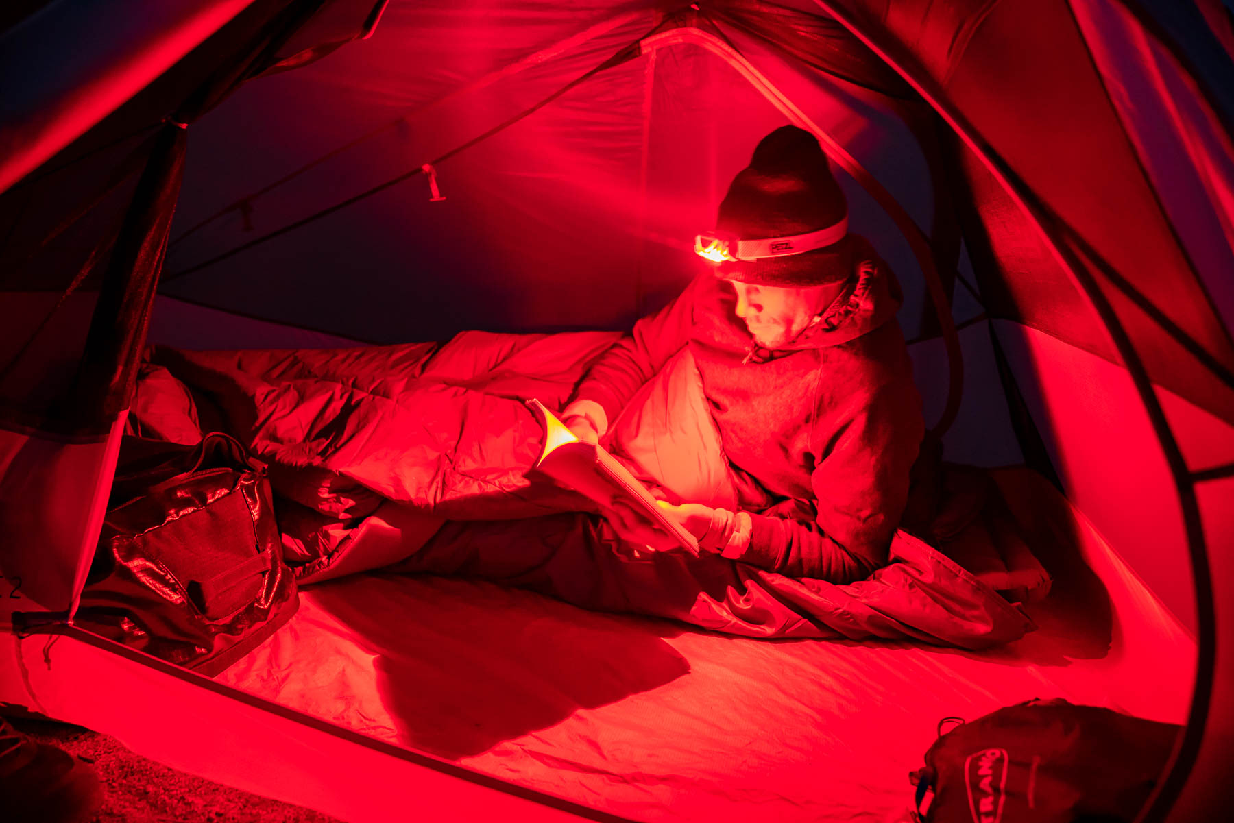 Red light headlamp inside tent