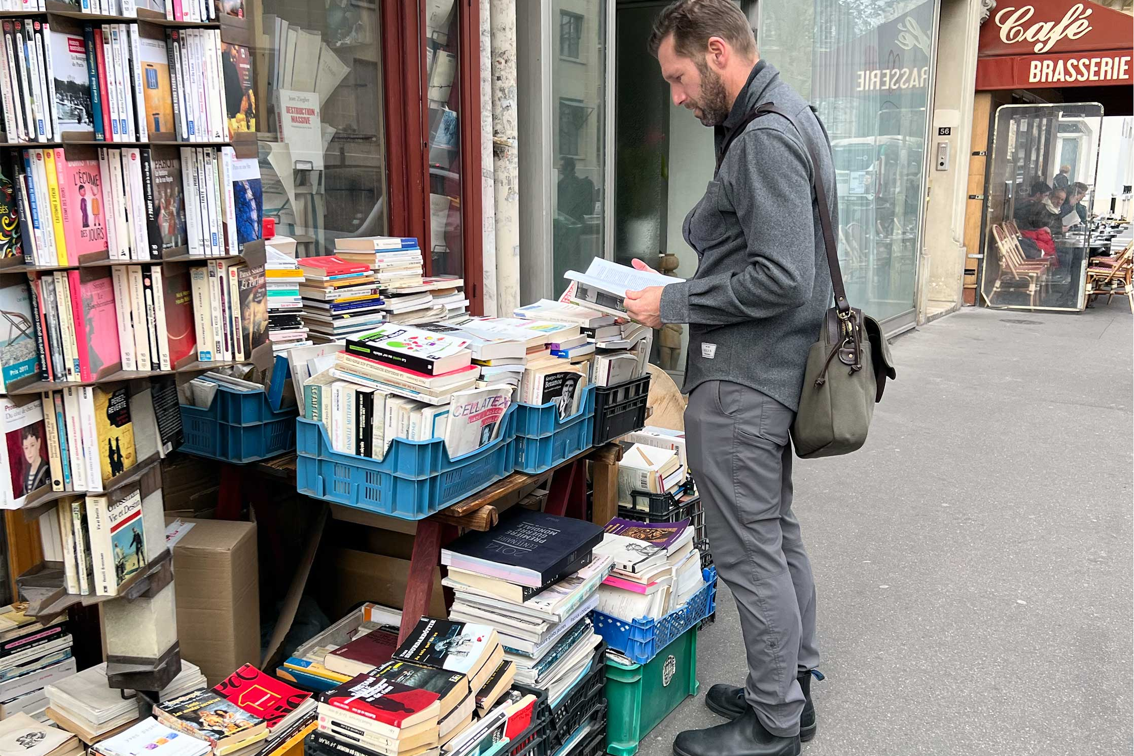 the author in paris, france looking through books