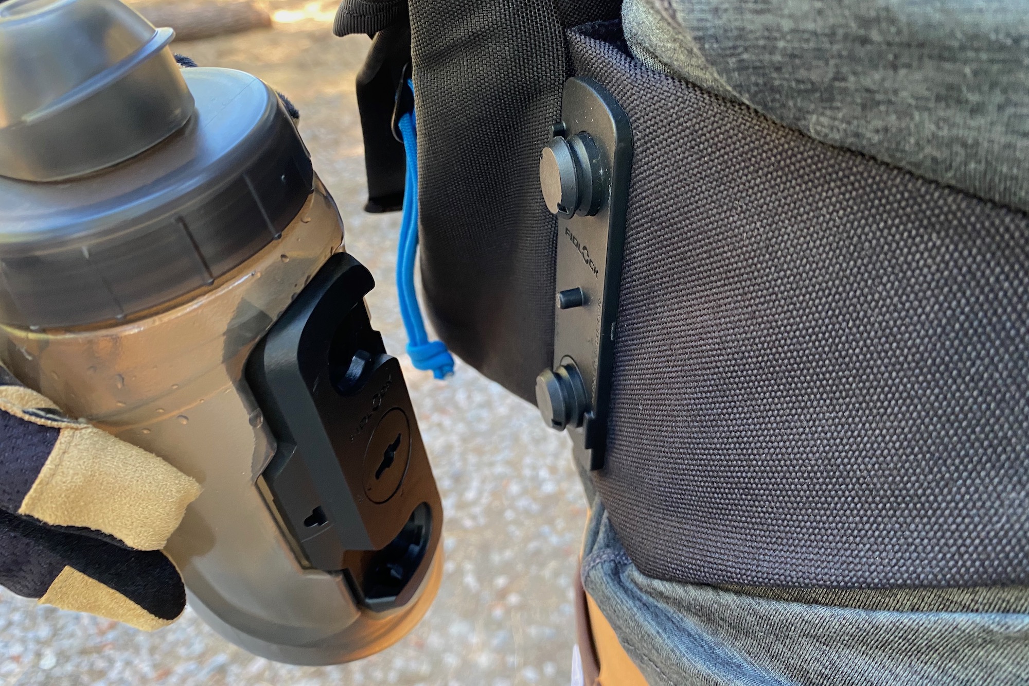 The Fidlock water bottle and attachment on the High Above Venture pack