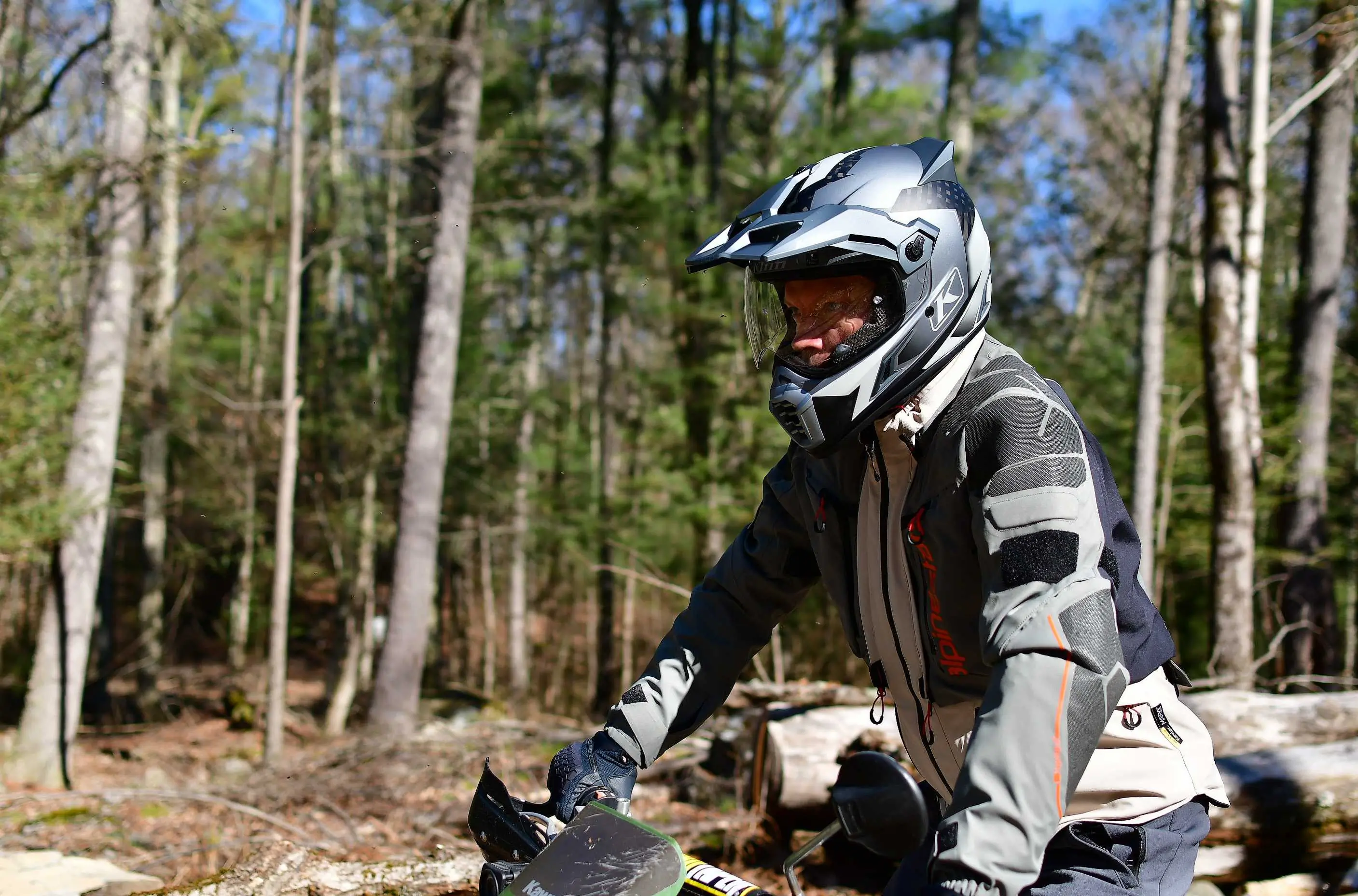 moto rider standing in pegs 