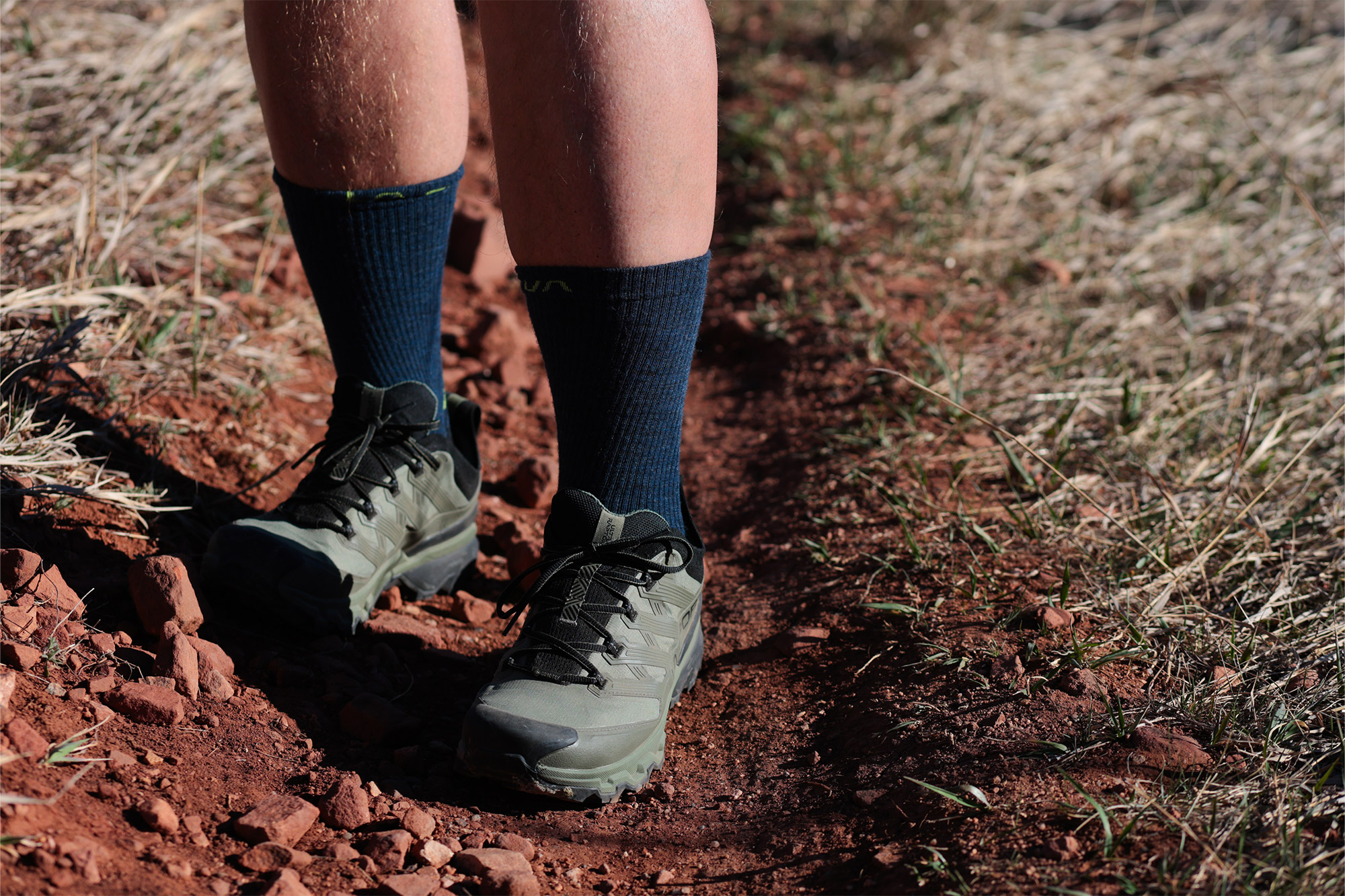 La Sportiva Ultra Raptor 3 GTX trail runner worn on a dirt path showing fit and ground contact