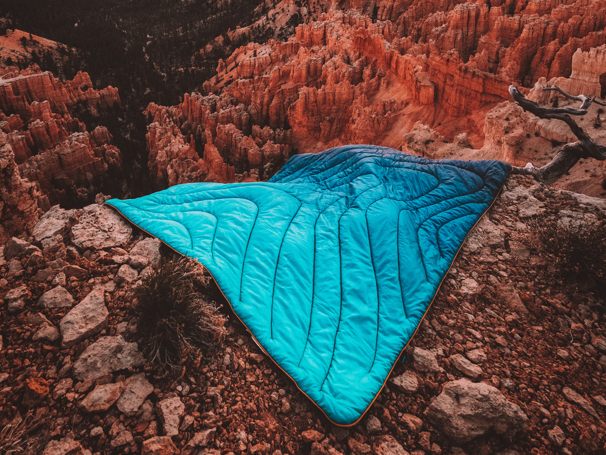 Rumpl OG Puffy Blanket on a mountain overlook