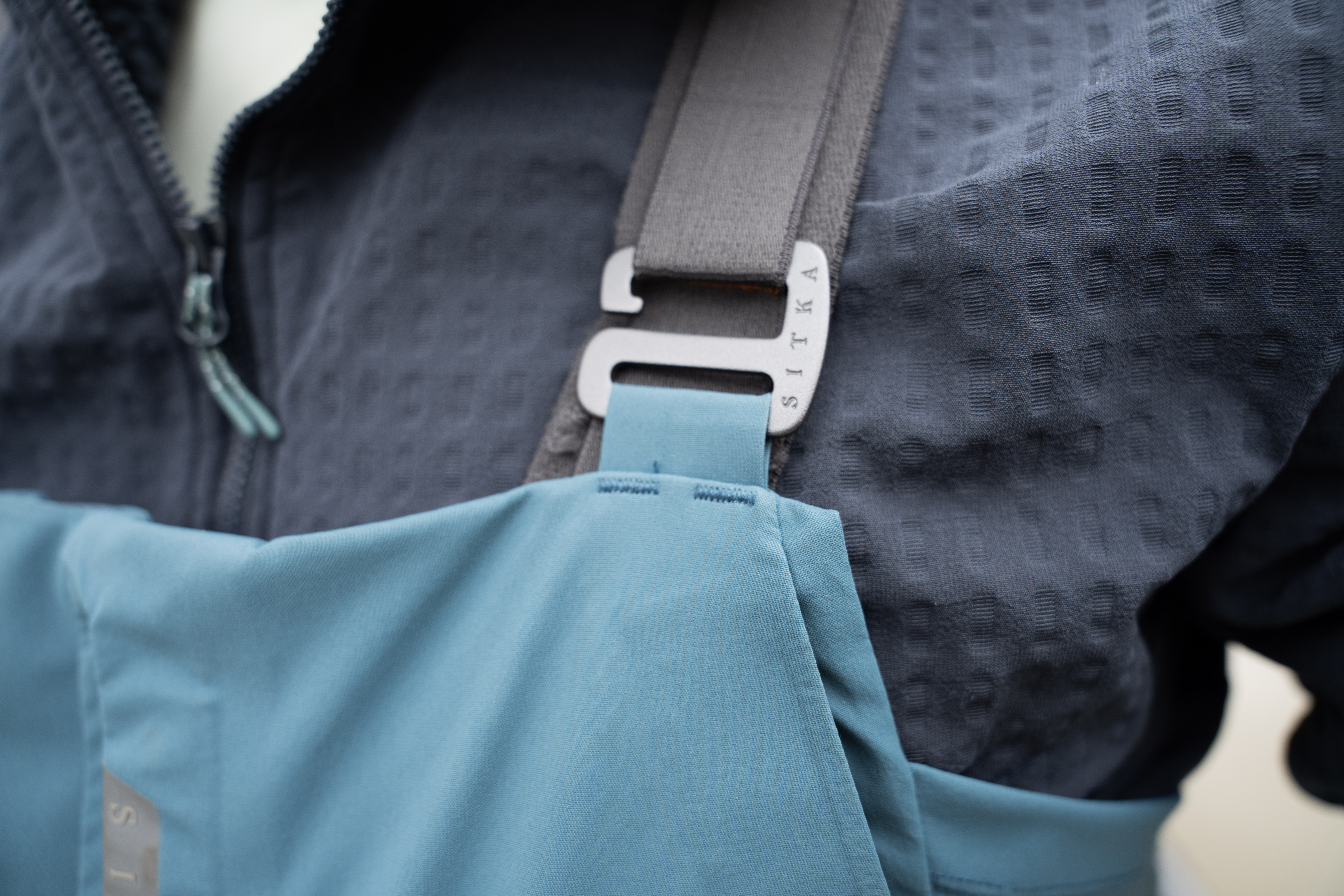 The hook and loop strap on the SITKA Cat 5 bib