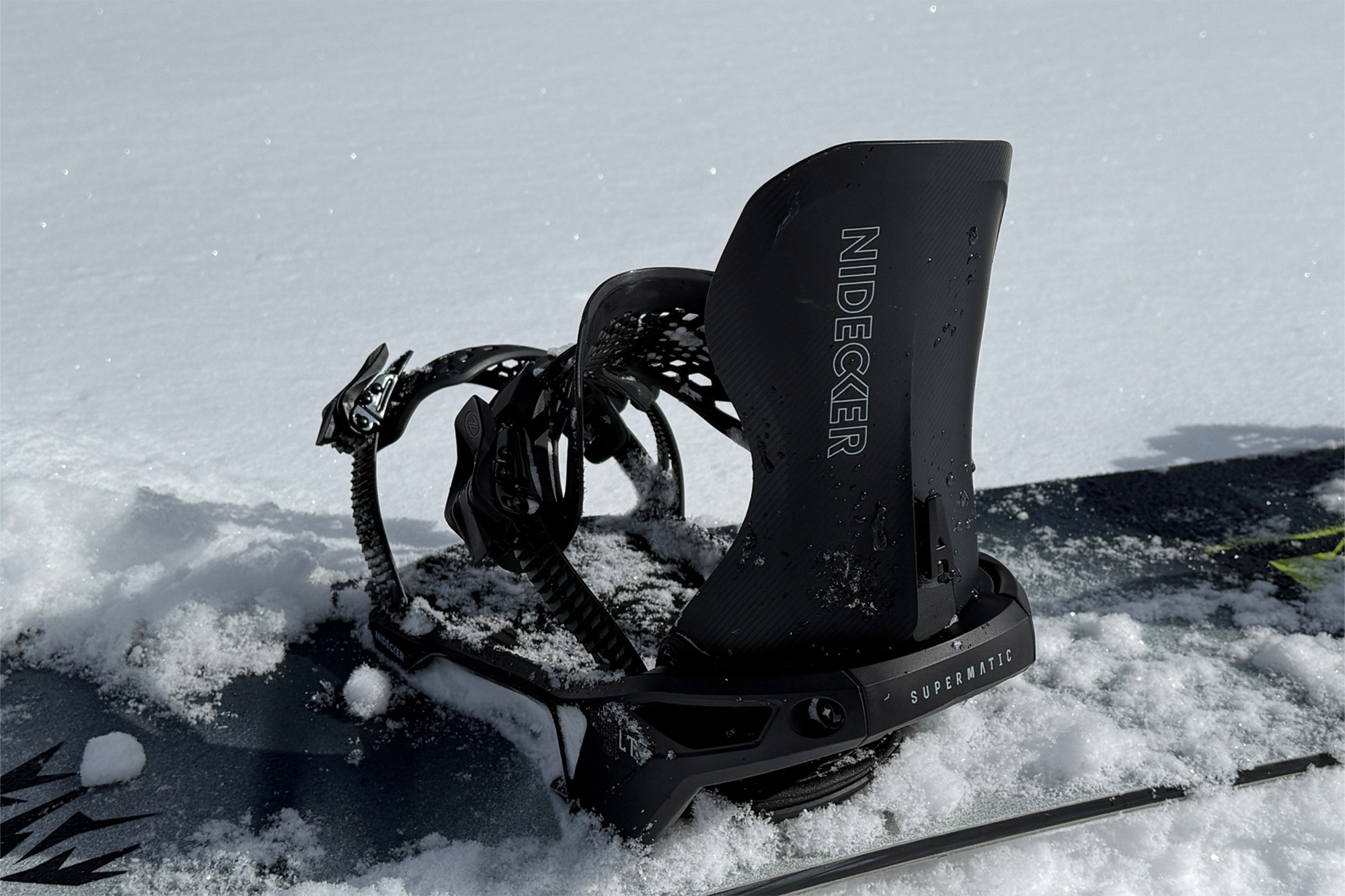 The Supermatic highback stands upright with snow packed around the base
