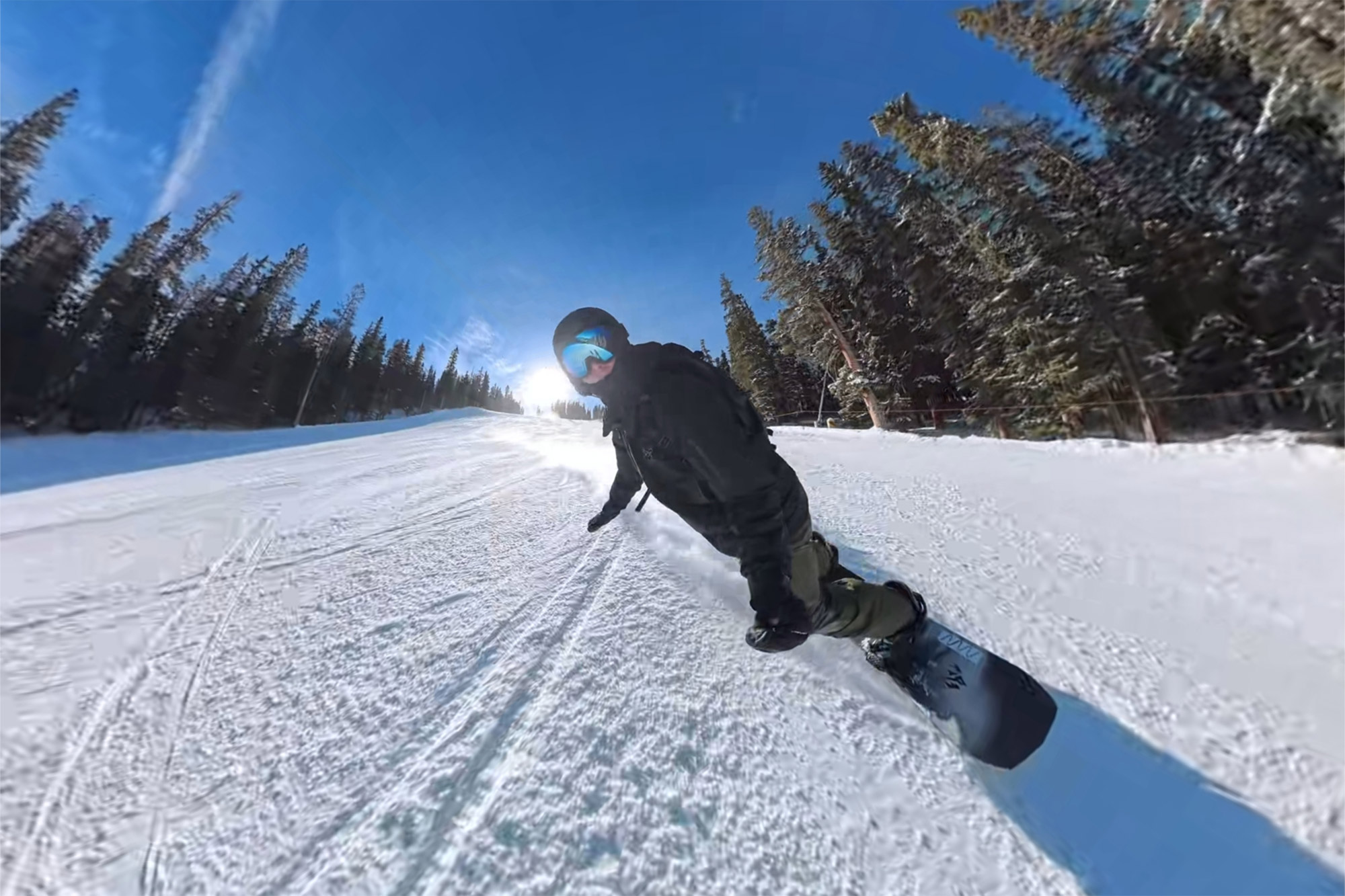 The Supermatic holds firm through a toe-side turn on packed snow