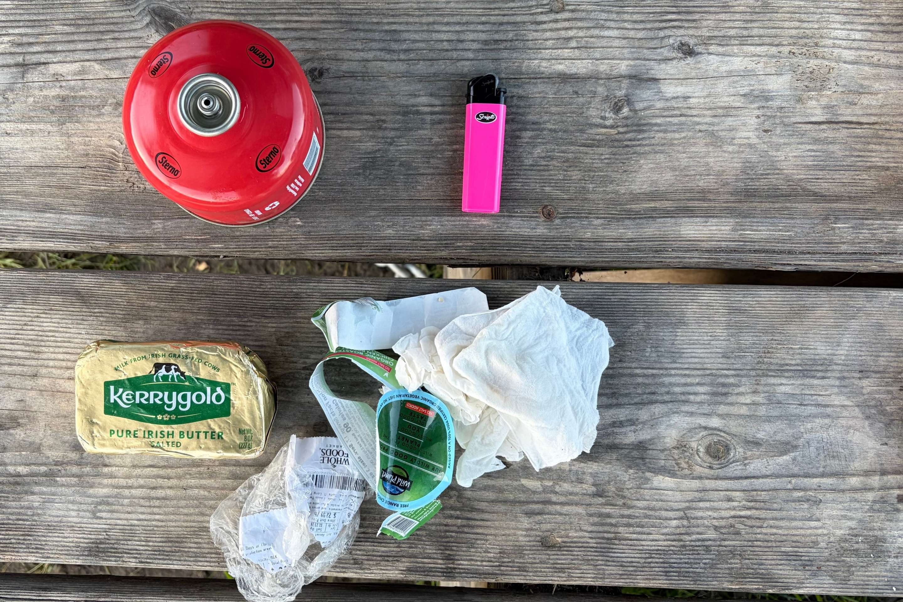 close-up shot of trash on picnic table