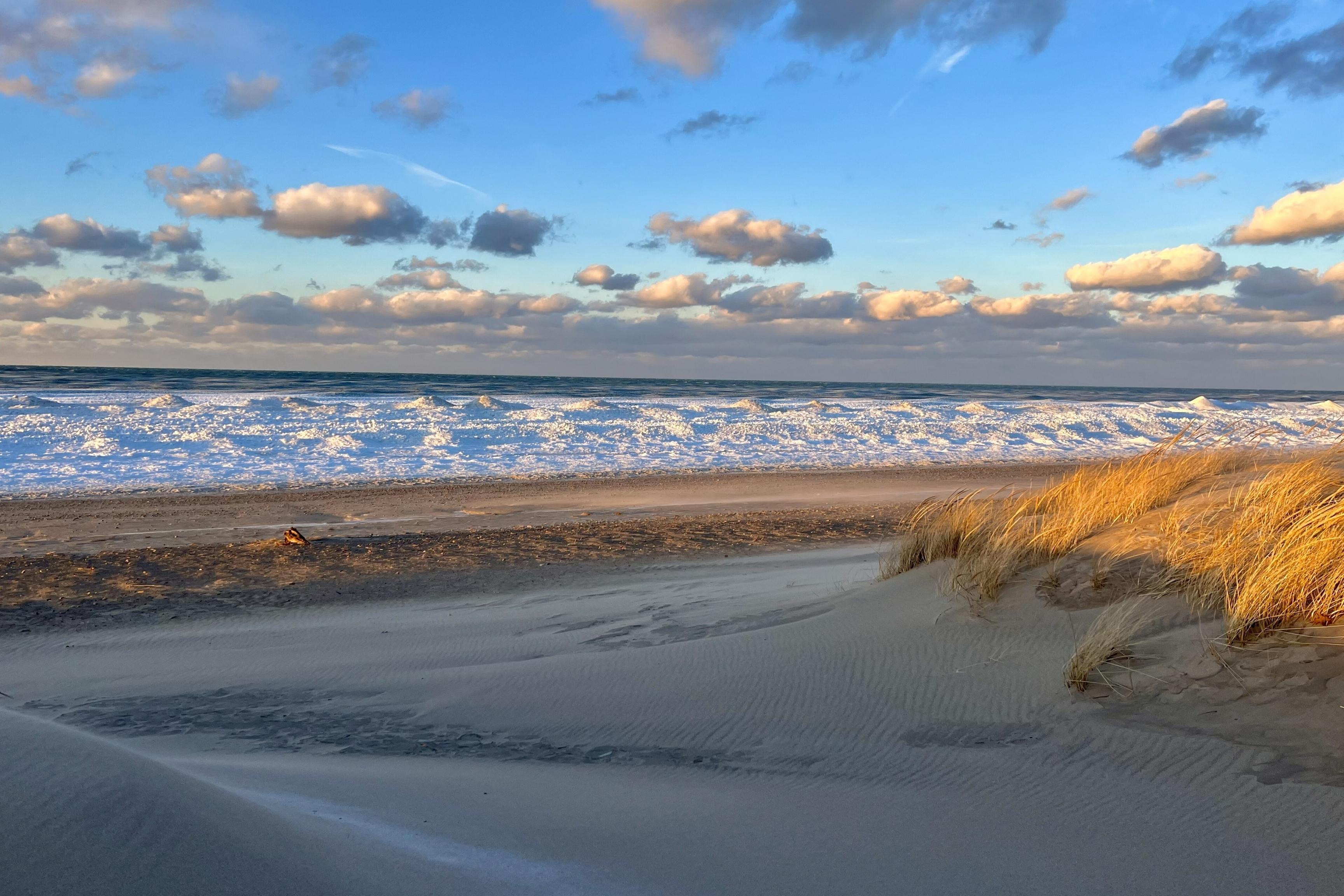 sandy beach with blue sky