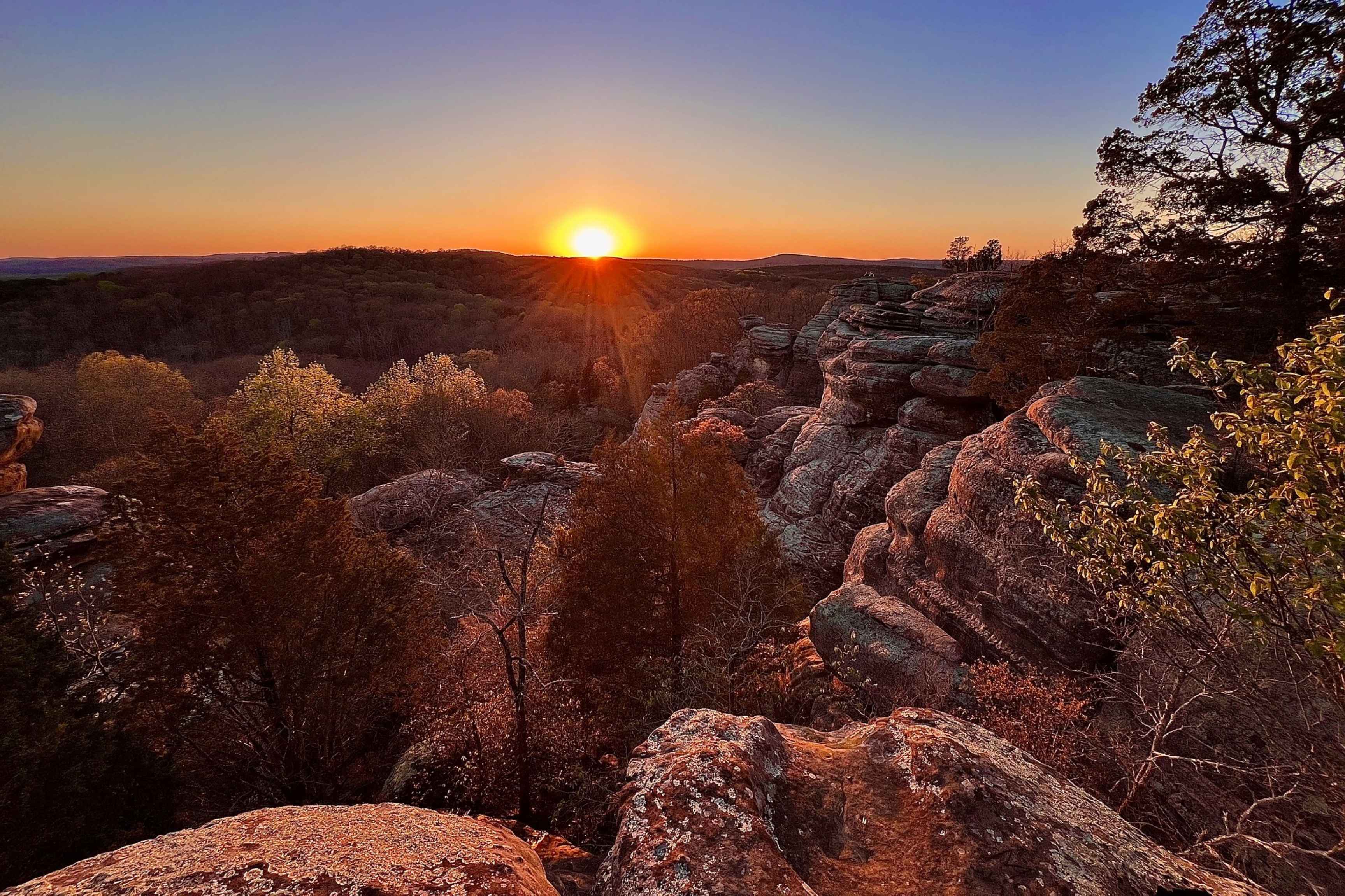 sunrise over rocky canyon