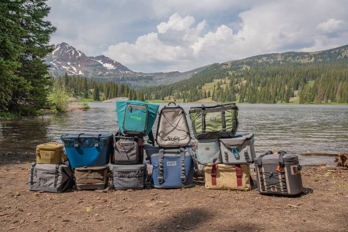 best soft coolers stacked by a lake