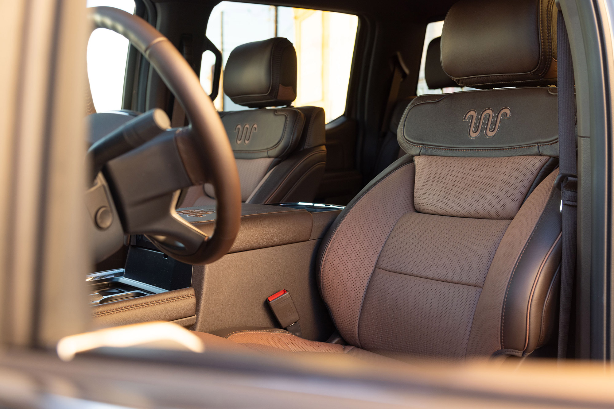 Front leather seat with King Ranch stitching inside the Ford F 350 King Ranch Tremor