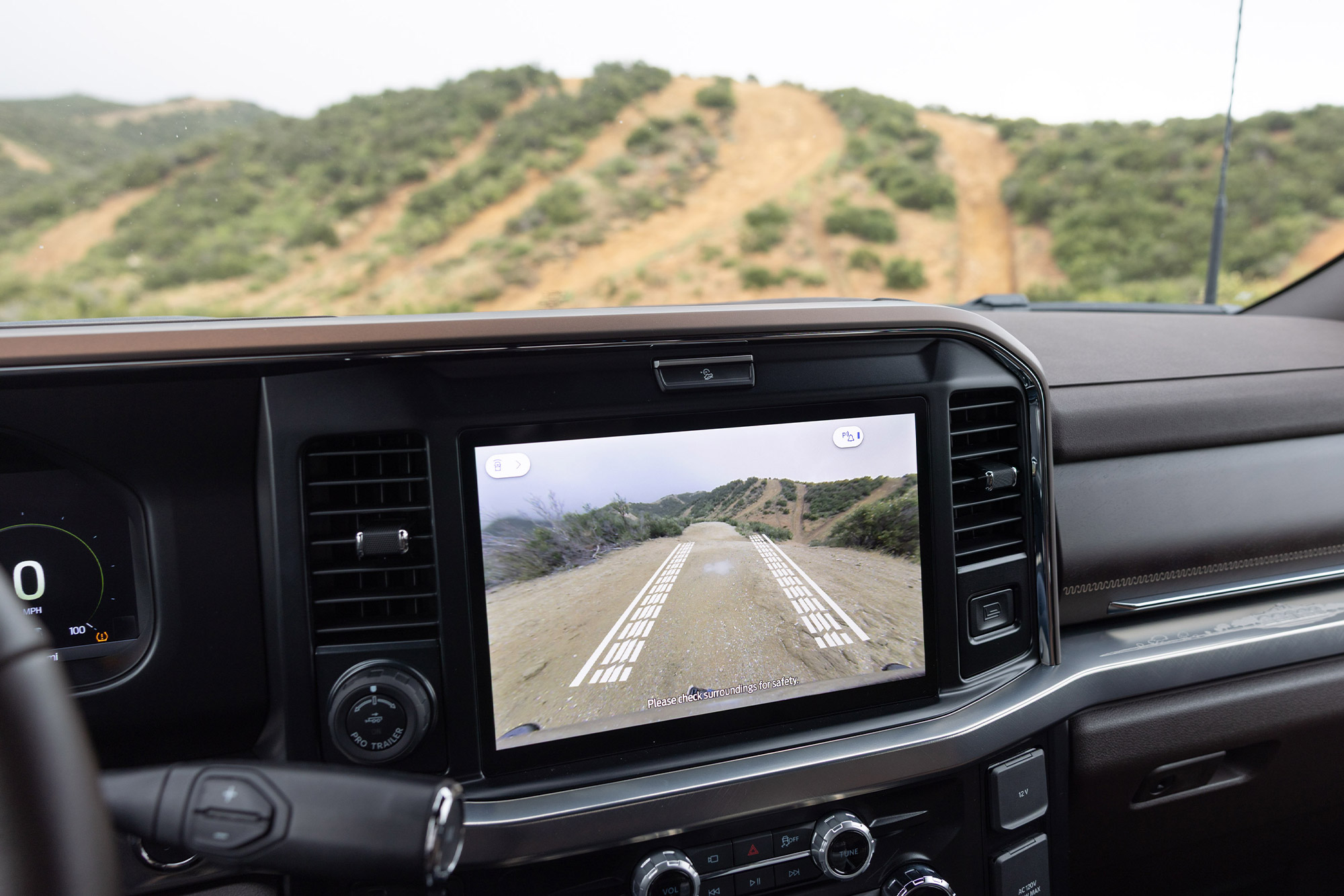 Center touchscreen showing front trail camera view in the Ford F 350 Tremor interior