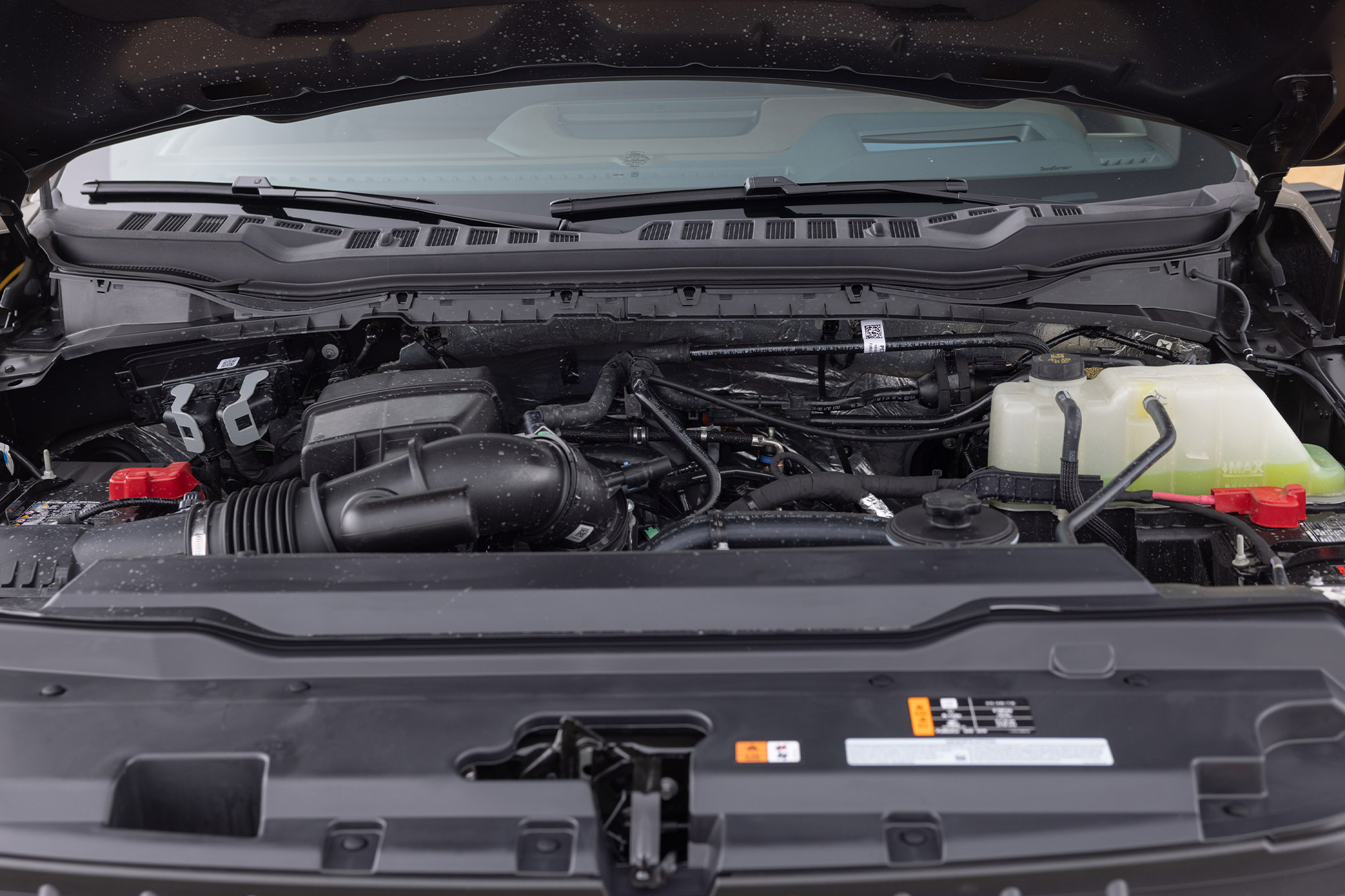 Engine bay and components under the hood of the 2026 Ford F 350 Tremor