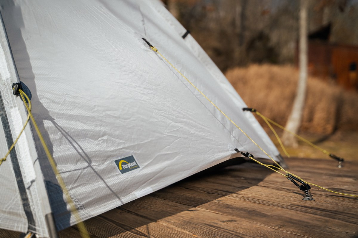 Tarptent shelter corner detail showing guy lines and stake attachment