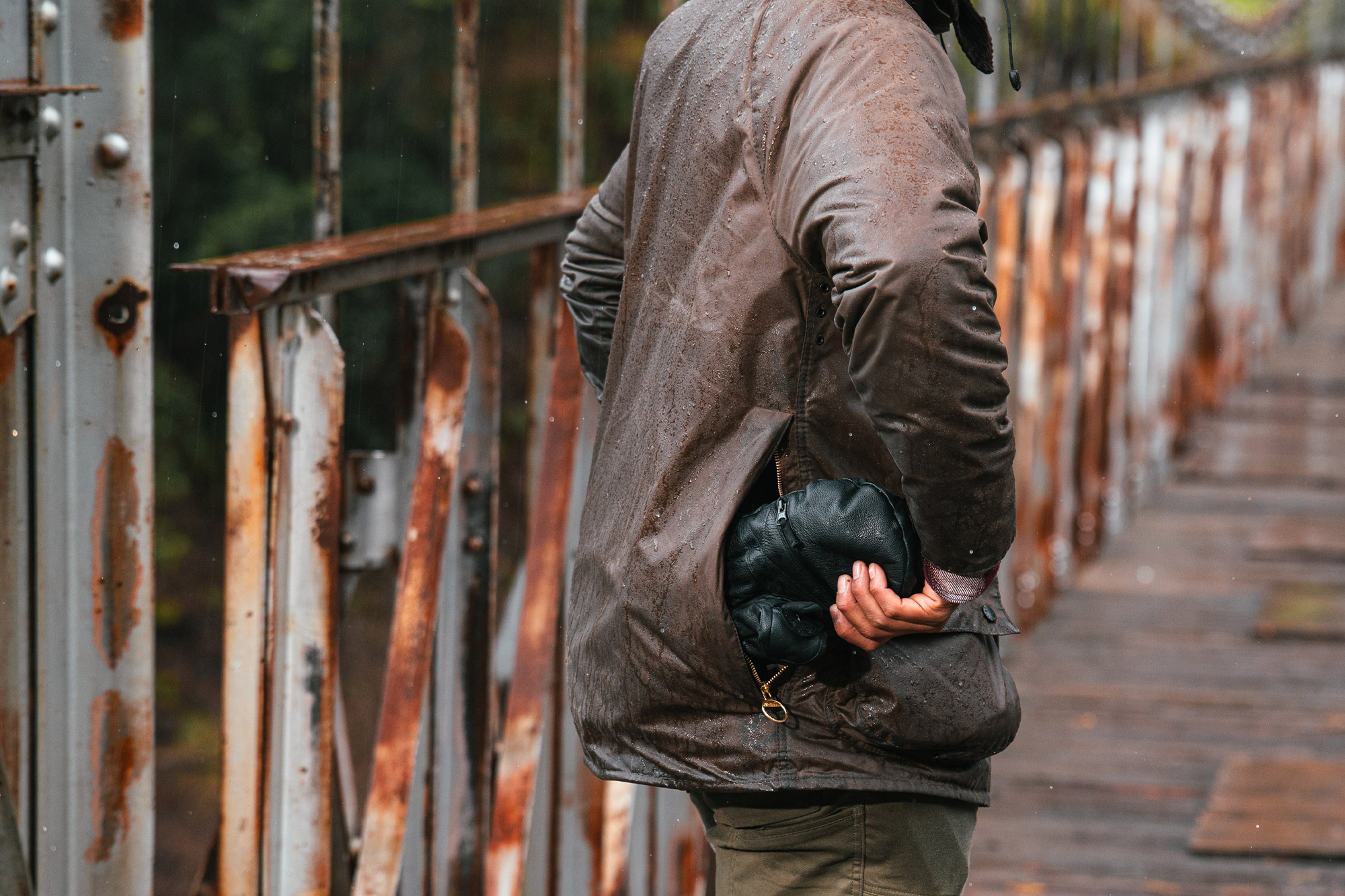 Rear view of the Barbour Beaufort Wax Jacket showing access to the large game pocket