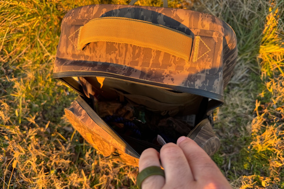 Top-down view of the backpack opened to show the main storage compartment