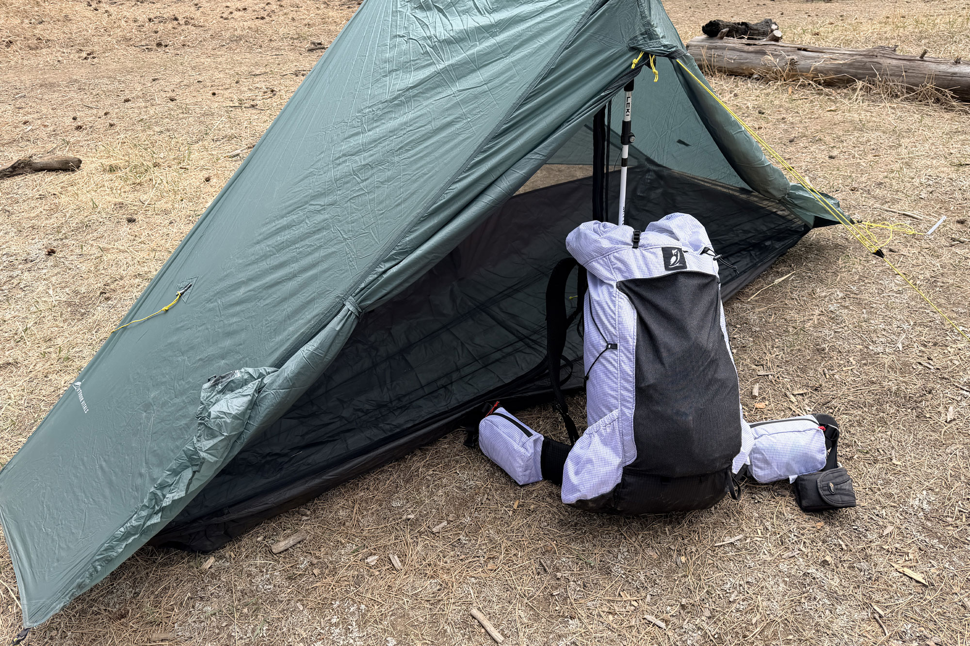 Outdoor Vitals Carbon Evo 50 Backpack next to the tent