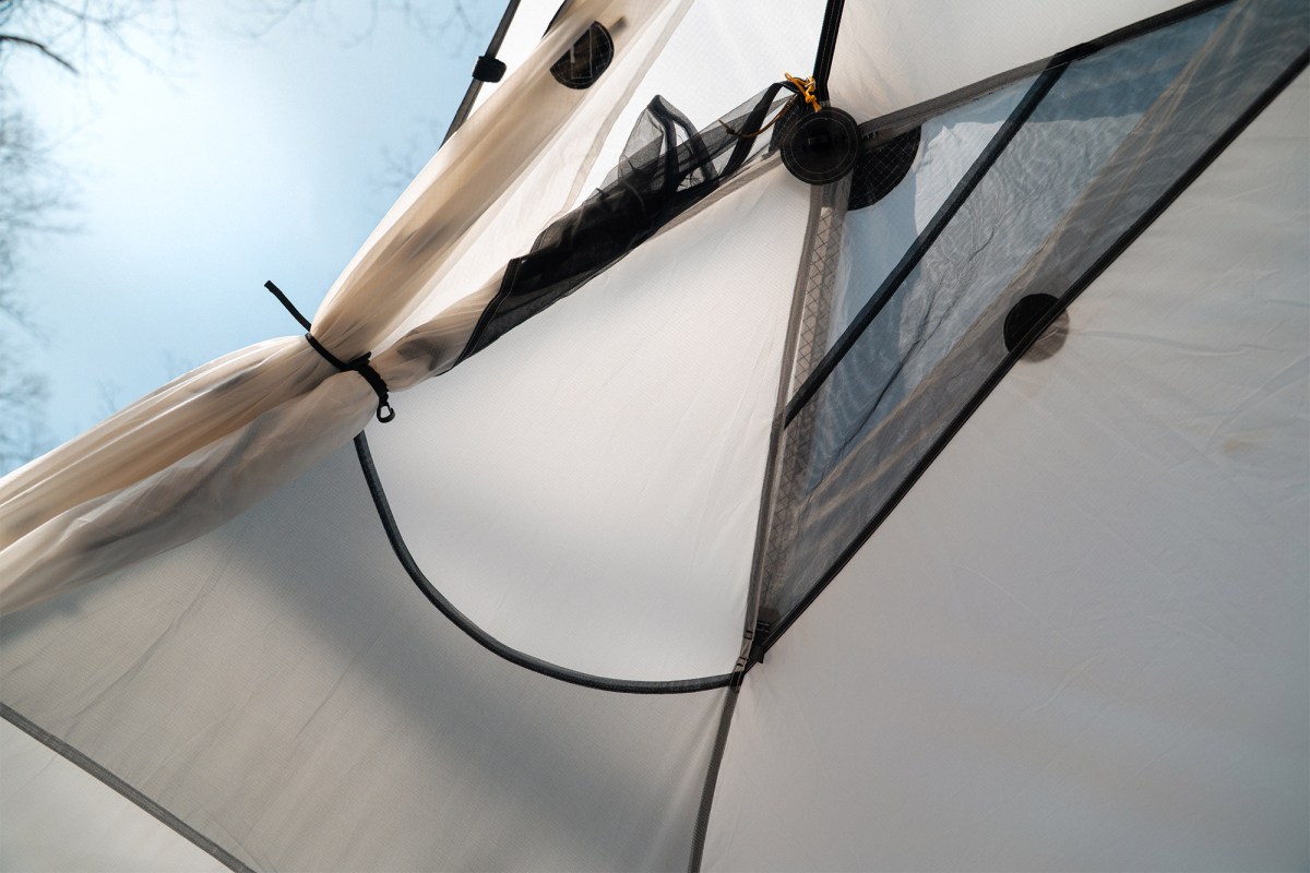 Tarptent dome vent opened to sky with mesh and fabric rolled back