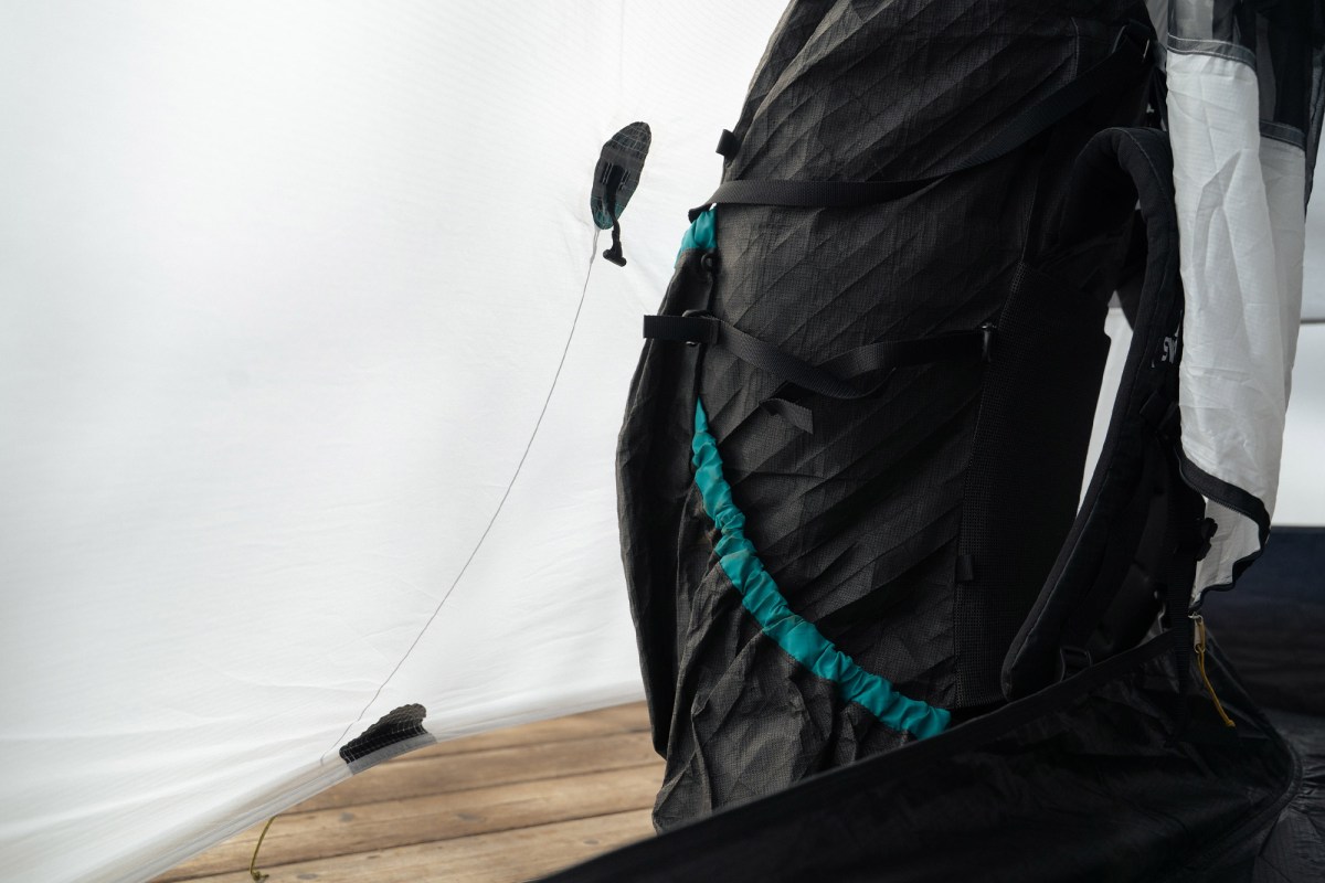 Tarptent vestibule area with backpack stored inside