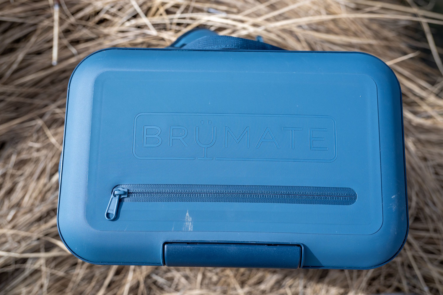 Top view of the BrüMate MagPack showing the embossed logo and waterproof zipper.