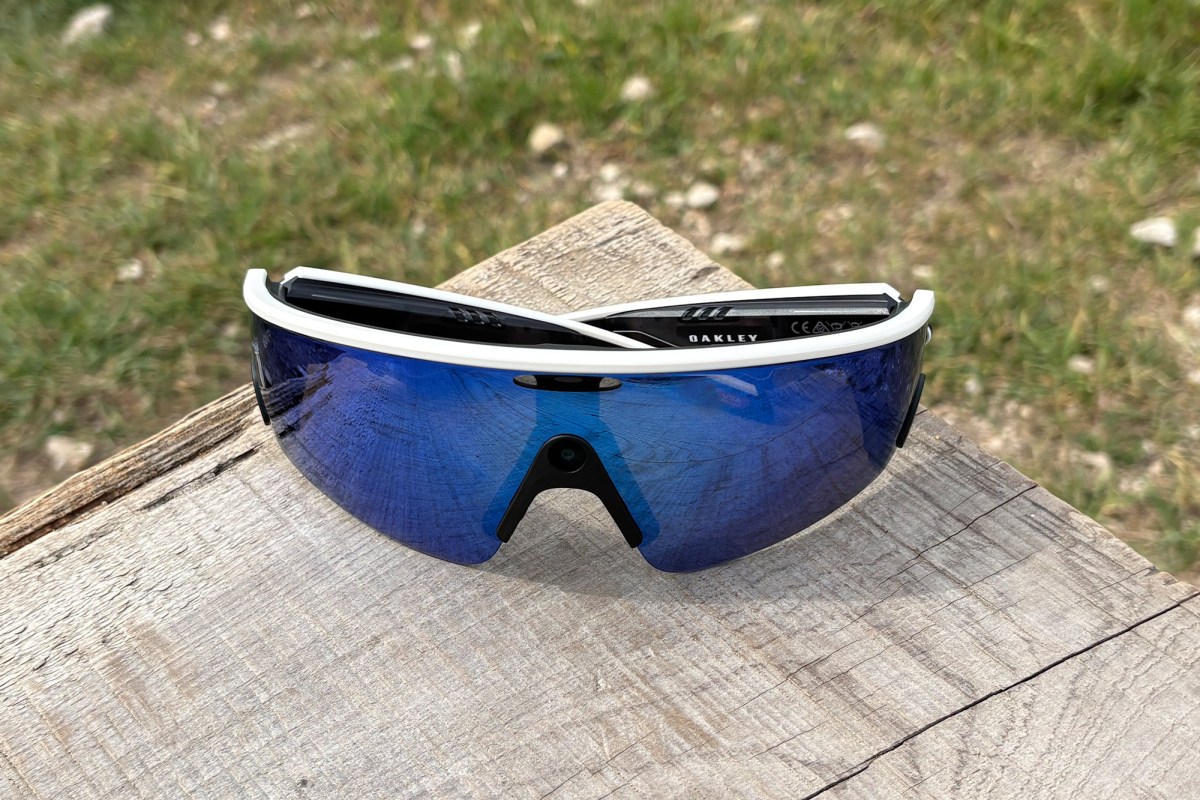 Oakley Meta Vanguard glasses placed on a wooden surface