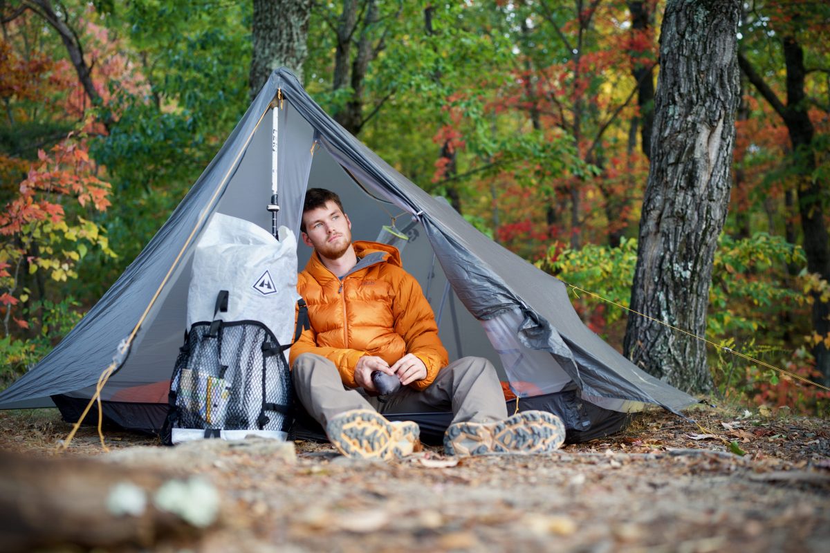 a gearjunkie tester using the gossamer gear the two tent while camping in tennessee