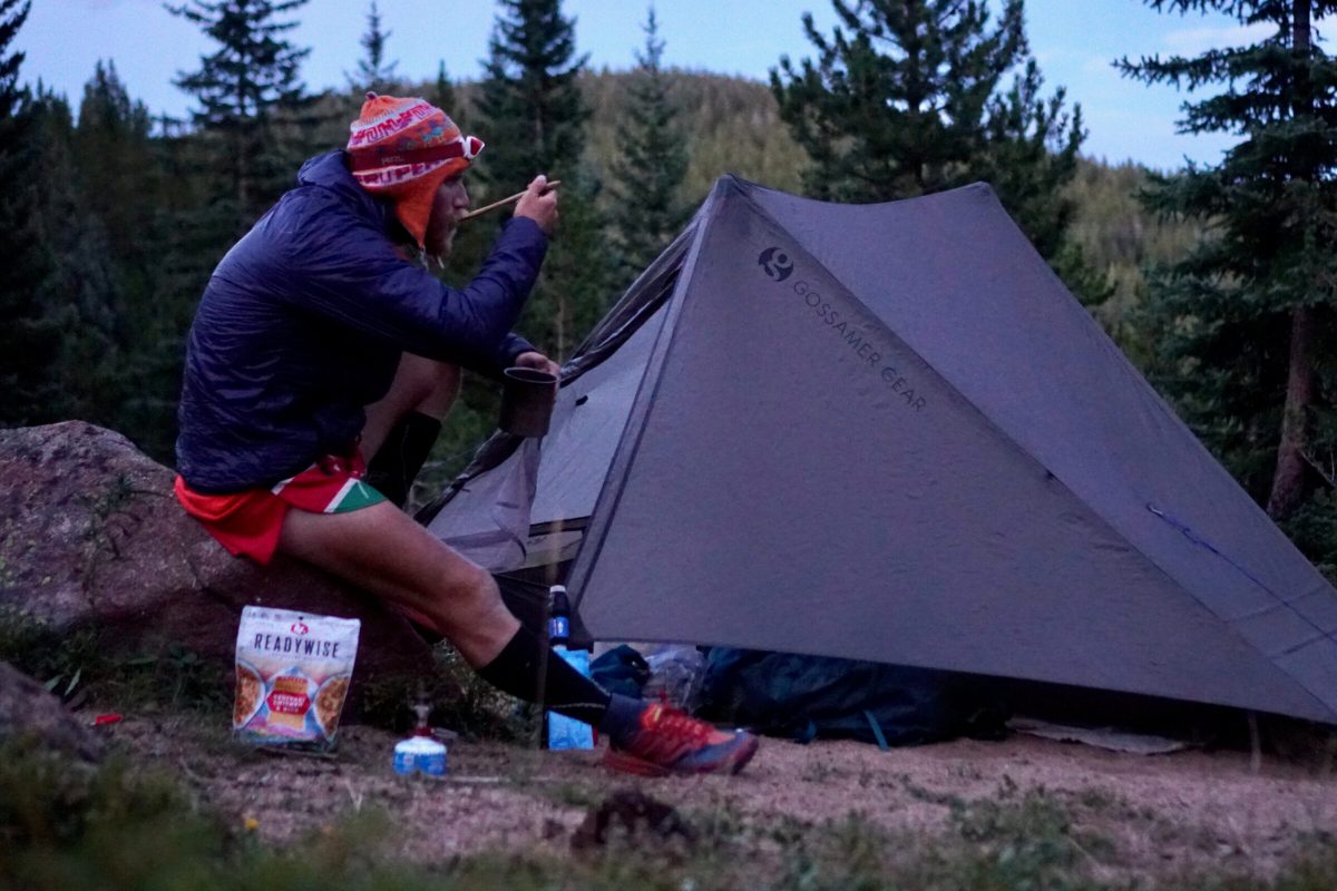 chris carter cooks on the msr pocket rocket during a thru-hike