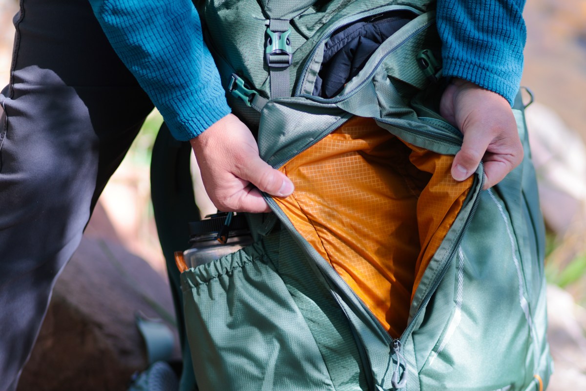The Gregory Baltoro backpack opens wide from the front to show the bright orange interior