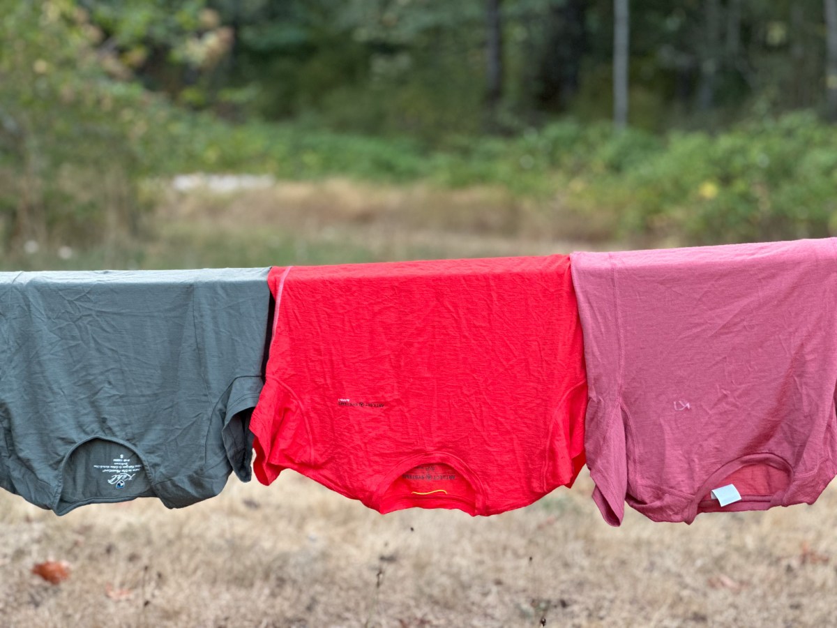 a set of three merino t-shirts on a line side-by-side for comparison