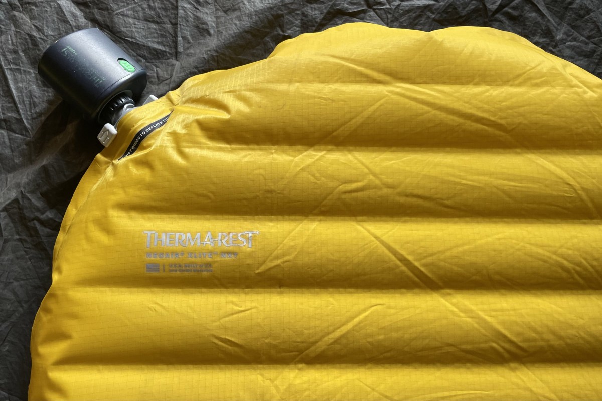Inflating the sleeping pad with the Therm-a-Rest NeoAir Micro Pump