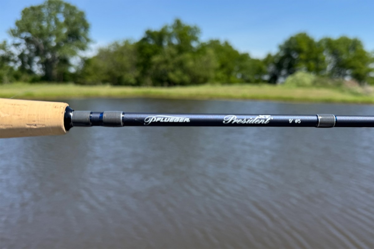 Close view of the rod label showing the 9’ #5 size marking over the water
