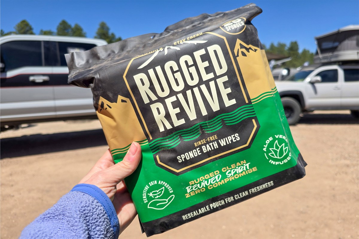 Rugged Revive Rinse-Free Bath Sponges in hand