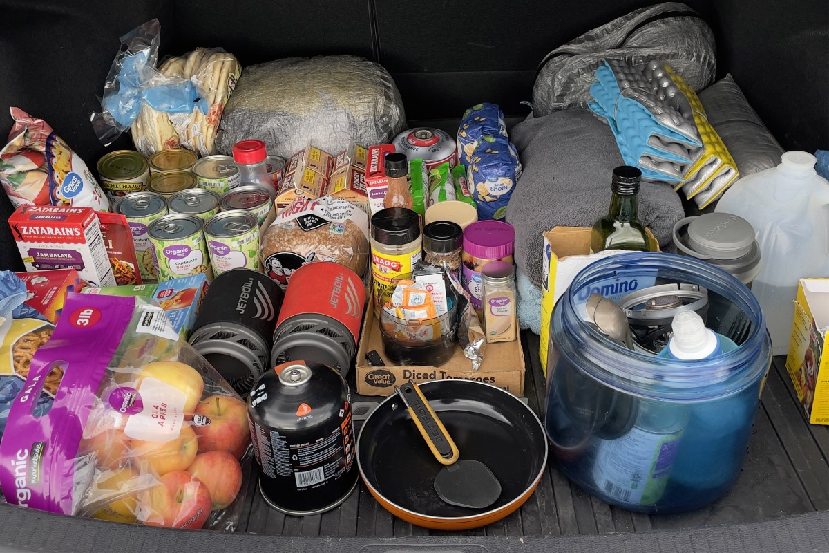 The car trunk full of food and extra gear