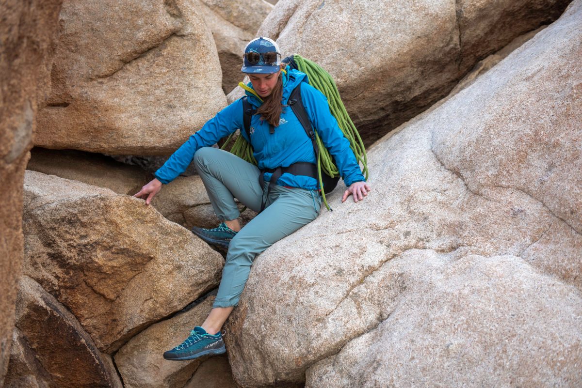 A Climber Scrambles in Joshua Tree National Park Wearing the Topo Designs Women's Boulder Pants