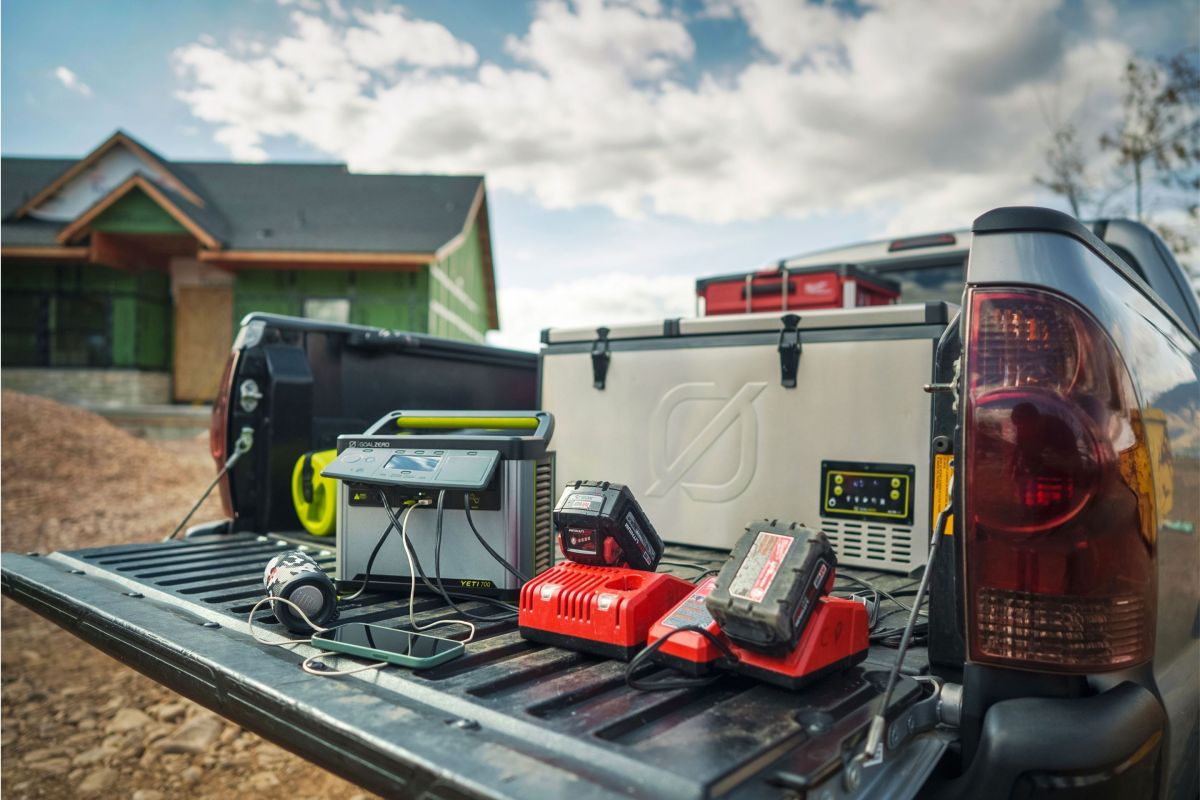 tools being charged by power station in the back of a truck