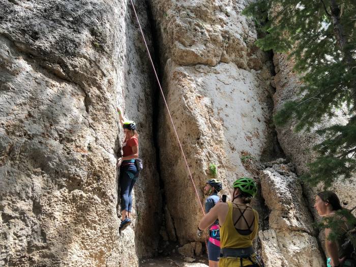 Helmet group climbing photo