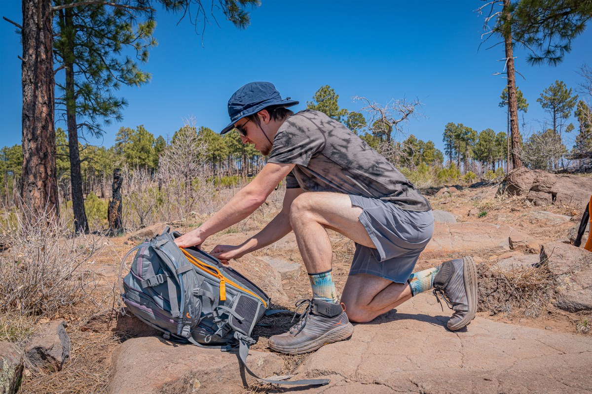 a gearjunkie tester wearing a smartwool merino wool t shirt while backpacking in colorado