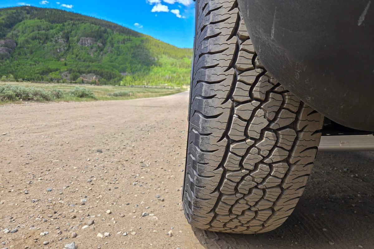 Close-up of BFGoodrich Trail-Terrain T/A+ tire tread on a dirt road
