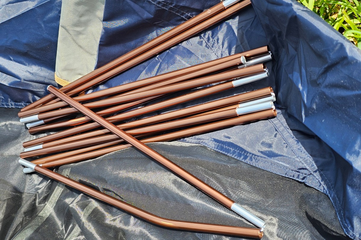 Late Start tent poles laid out on the tent body before setup