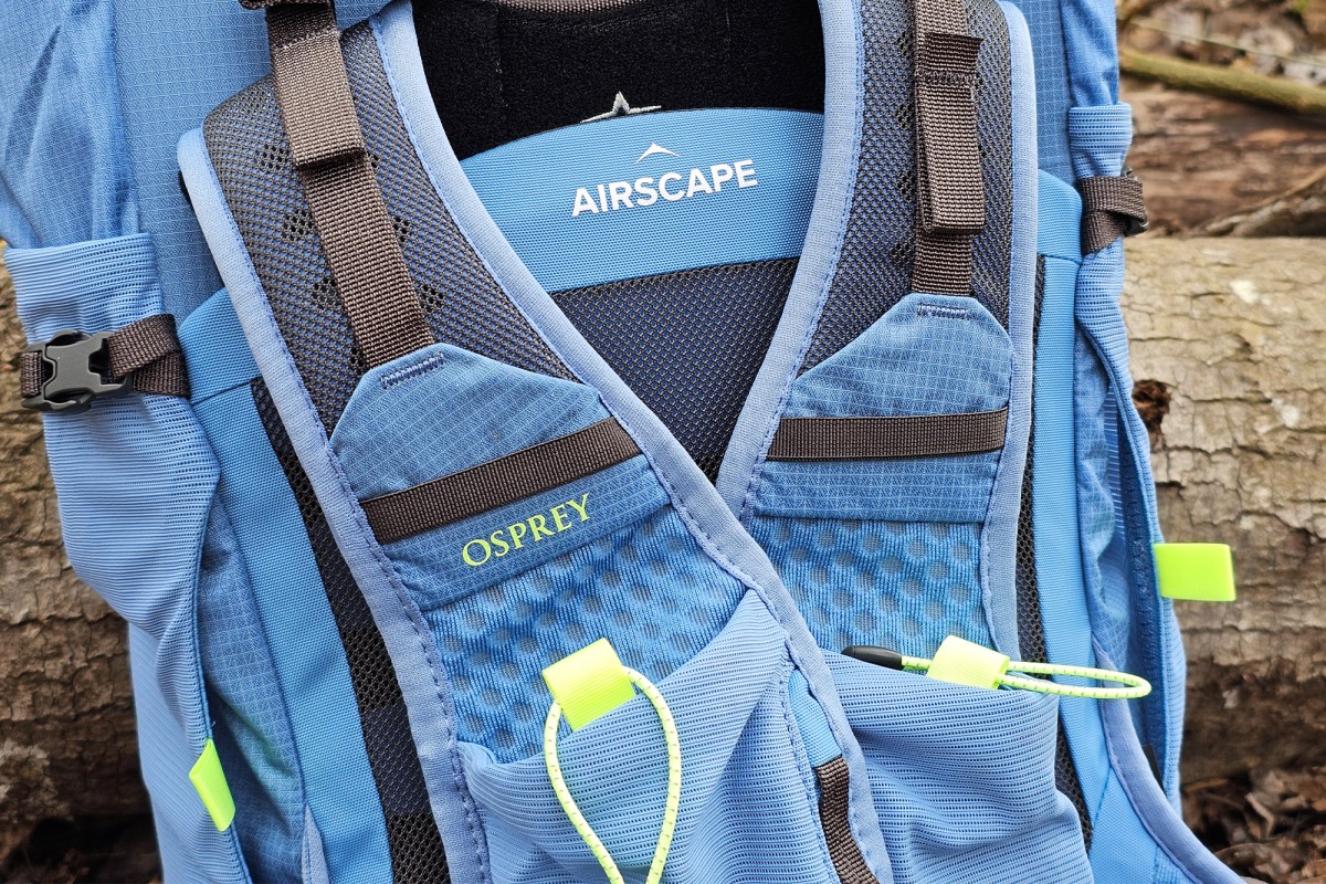 Close up of the Osprey pack back panel, shoulder straps, and front pockets