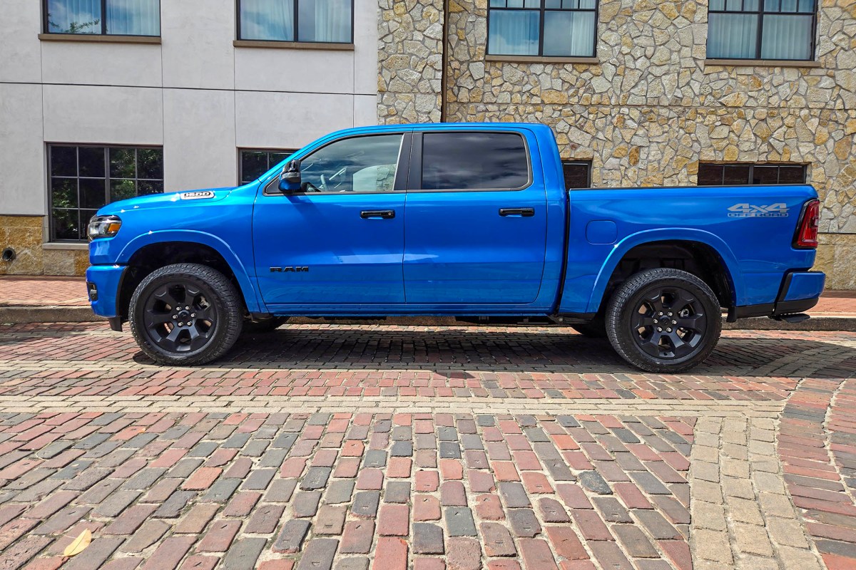 Blue Ram 1500 Lone Star parked in front of a stone building