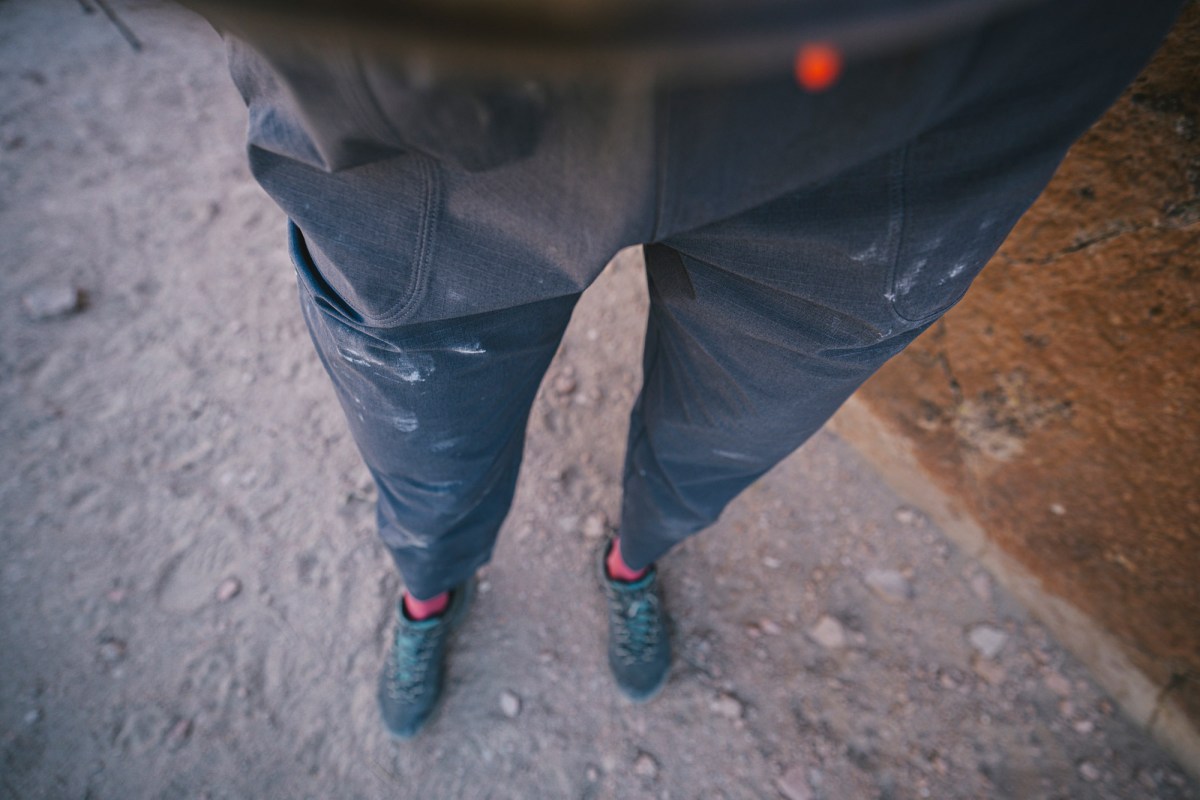 Close-up of Sequence Pants with chalk marks after climbing