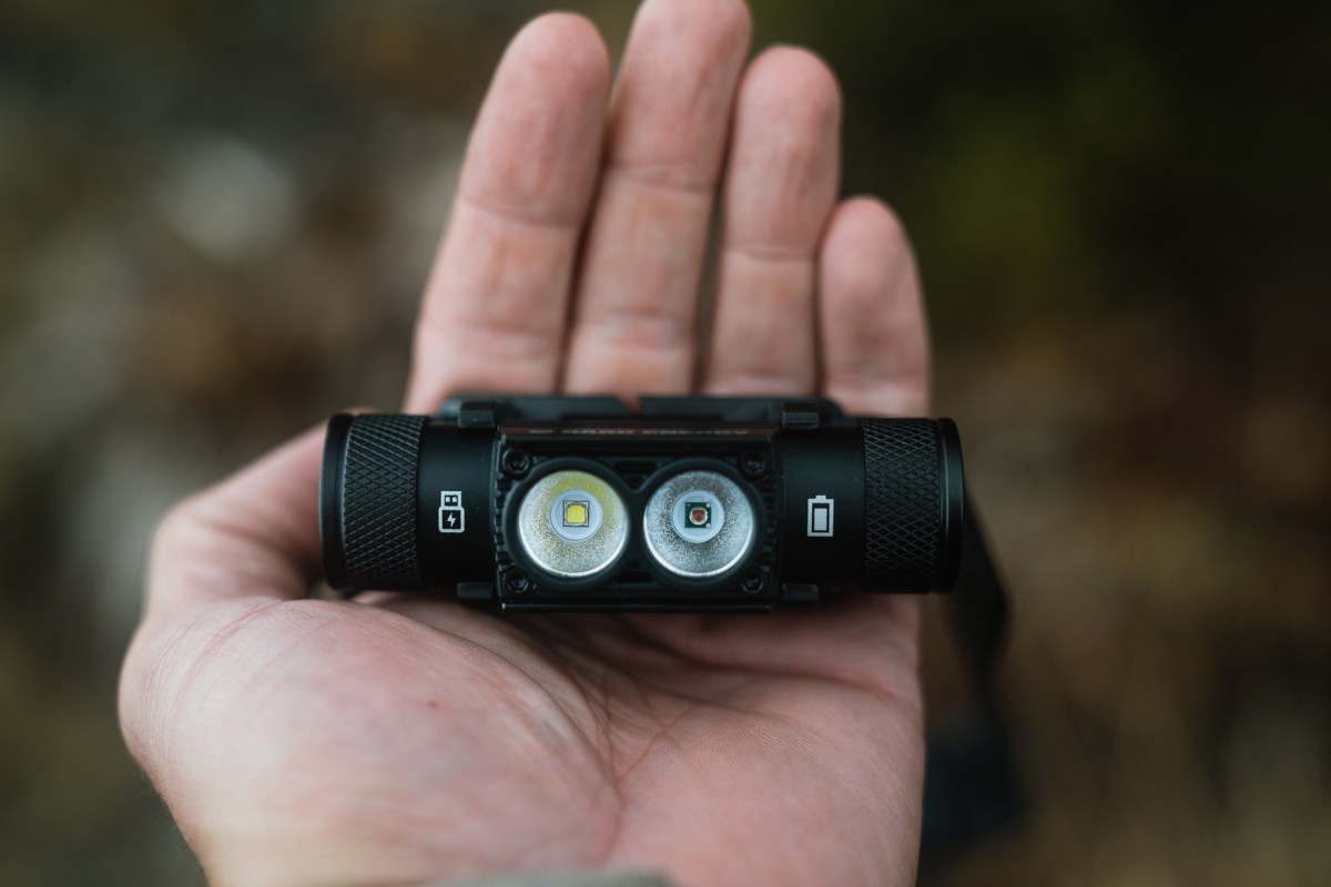 Dark Energy Oracle Headlamp in a hand